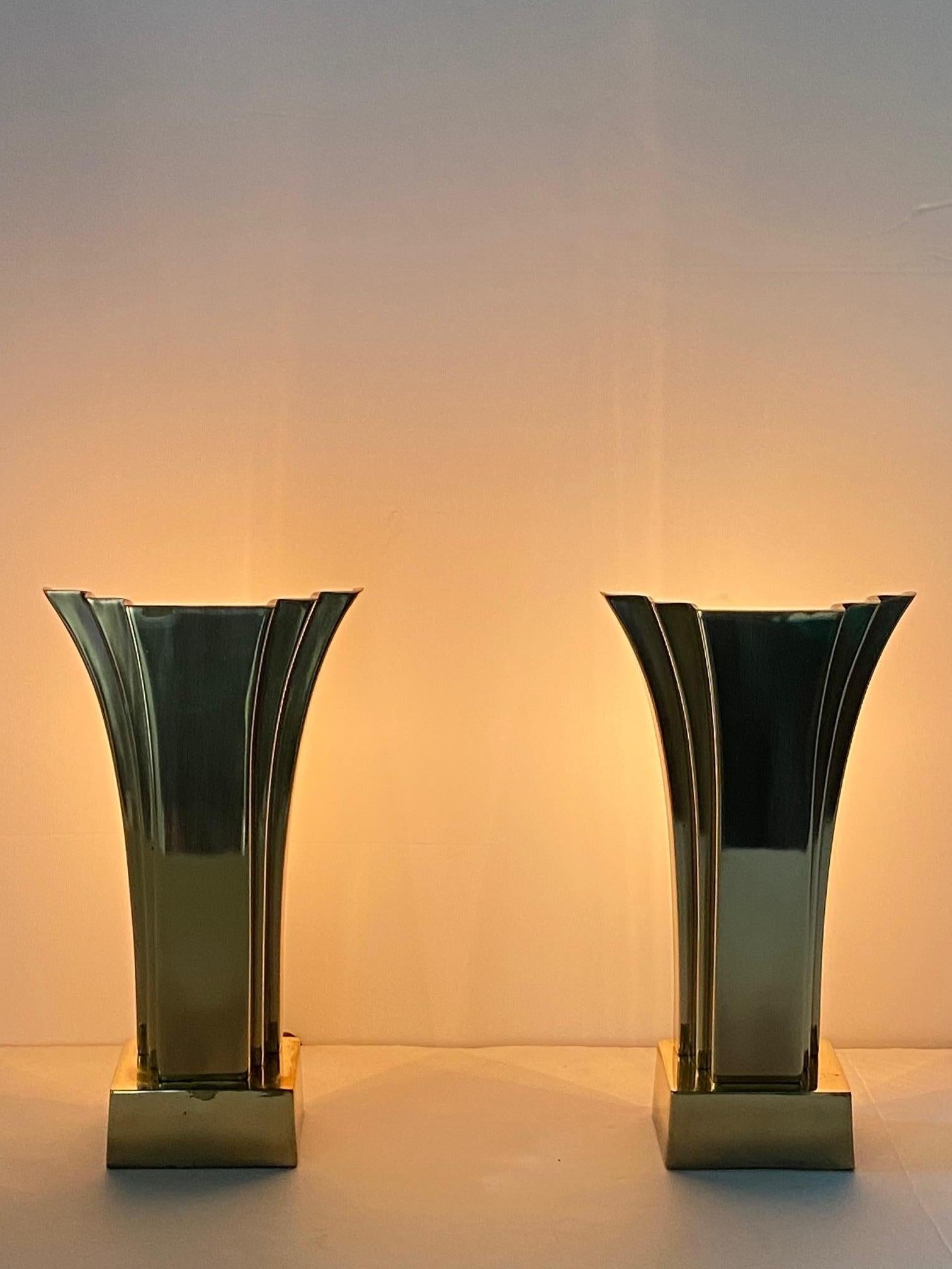 Sleek Art Deco pair of sculptural brass table lamps signed by Stiffel.