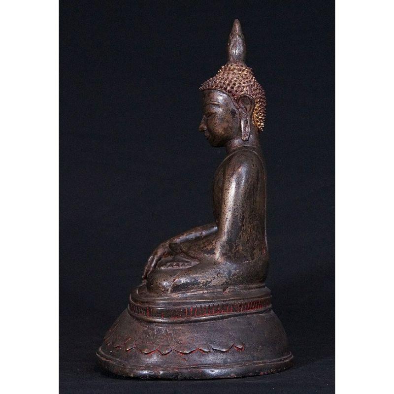 Material: bronze
36,5 cm high 
25 cm wide
Traces of the original gold can be found
Toungoo style
Bhumisparsha mudra
Originating from Burma
14-15th century / early Toungoo Period
With inscriptions in the base
A very special Buddha, the best