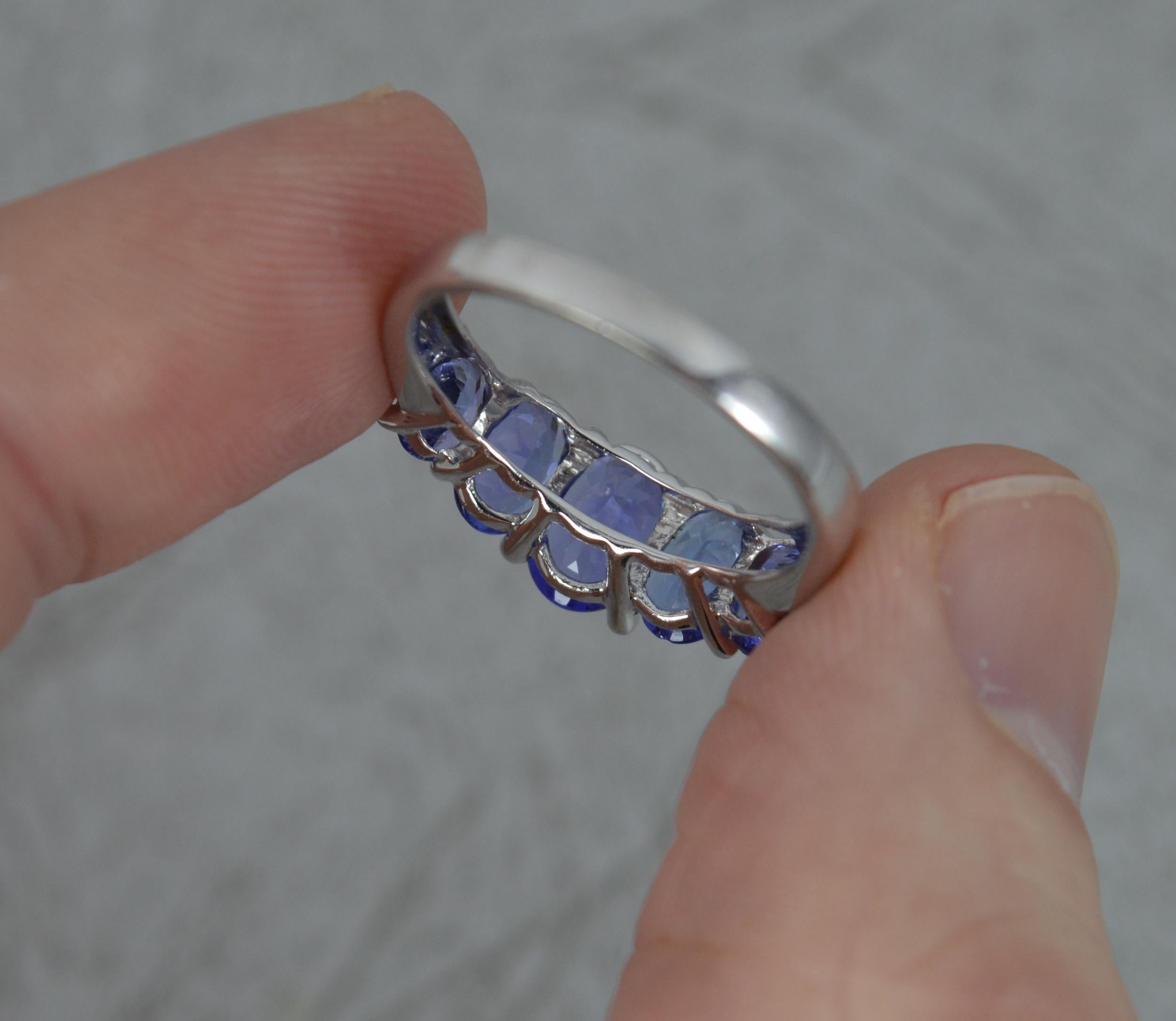 Oval Cut Superb 14 Carat White Gold and Five Tanzanite Ring