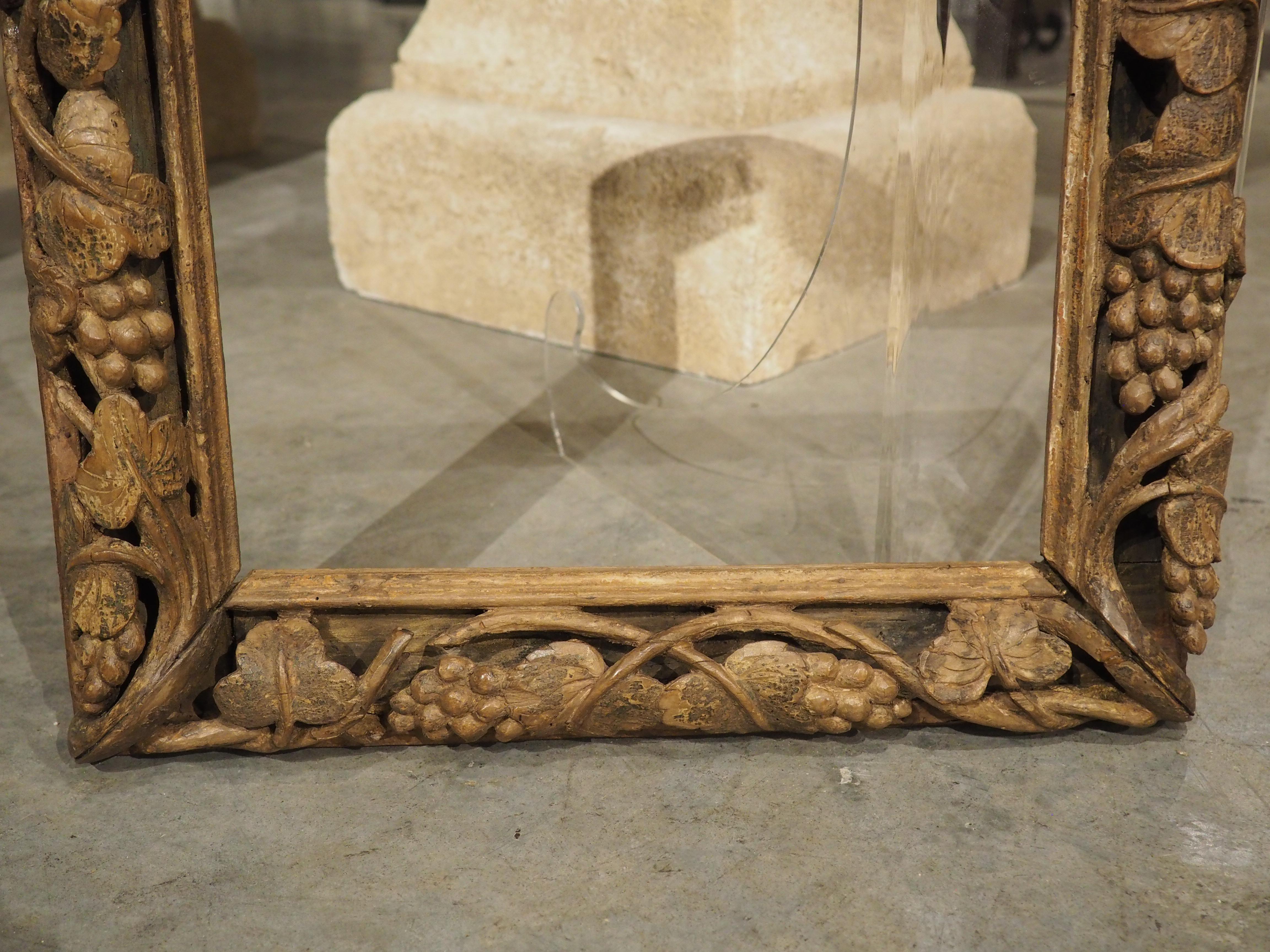 Hand-Carved Superb 16th Century Carved Wooden Frame with Pierced Grapevine Frieze For Sale