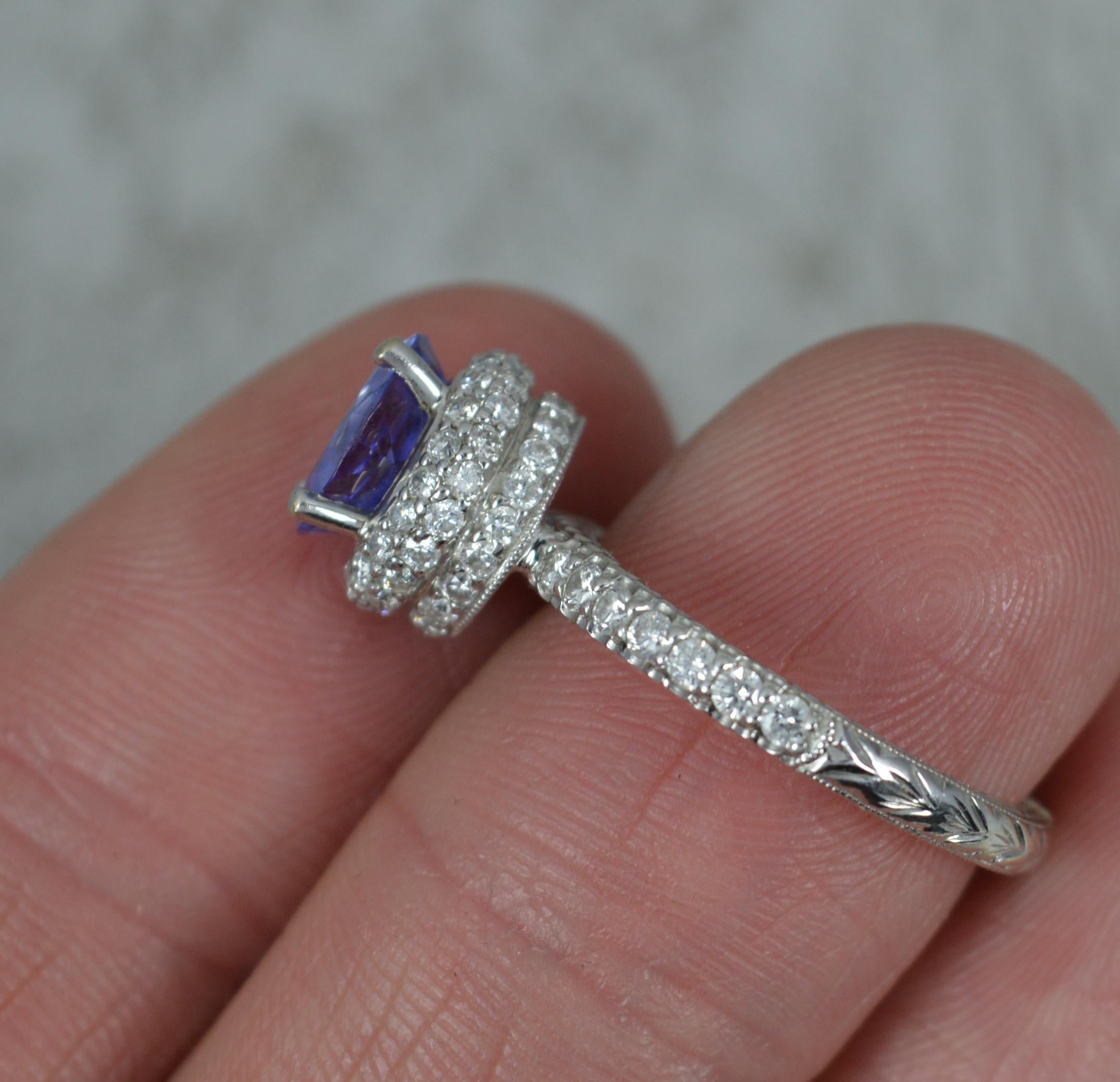 Round Cut Superb 18ct White Gold Tanzanite and 0.75ct Diamond Halo Engagement Ring For Sale