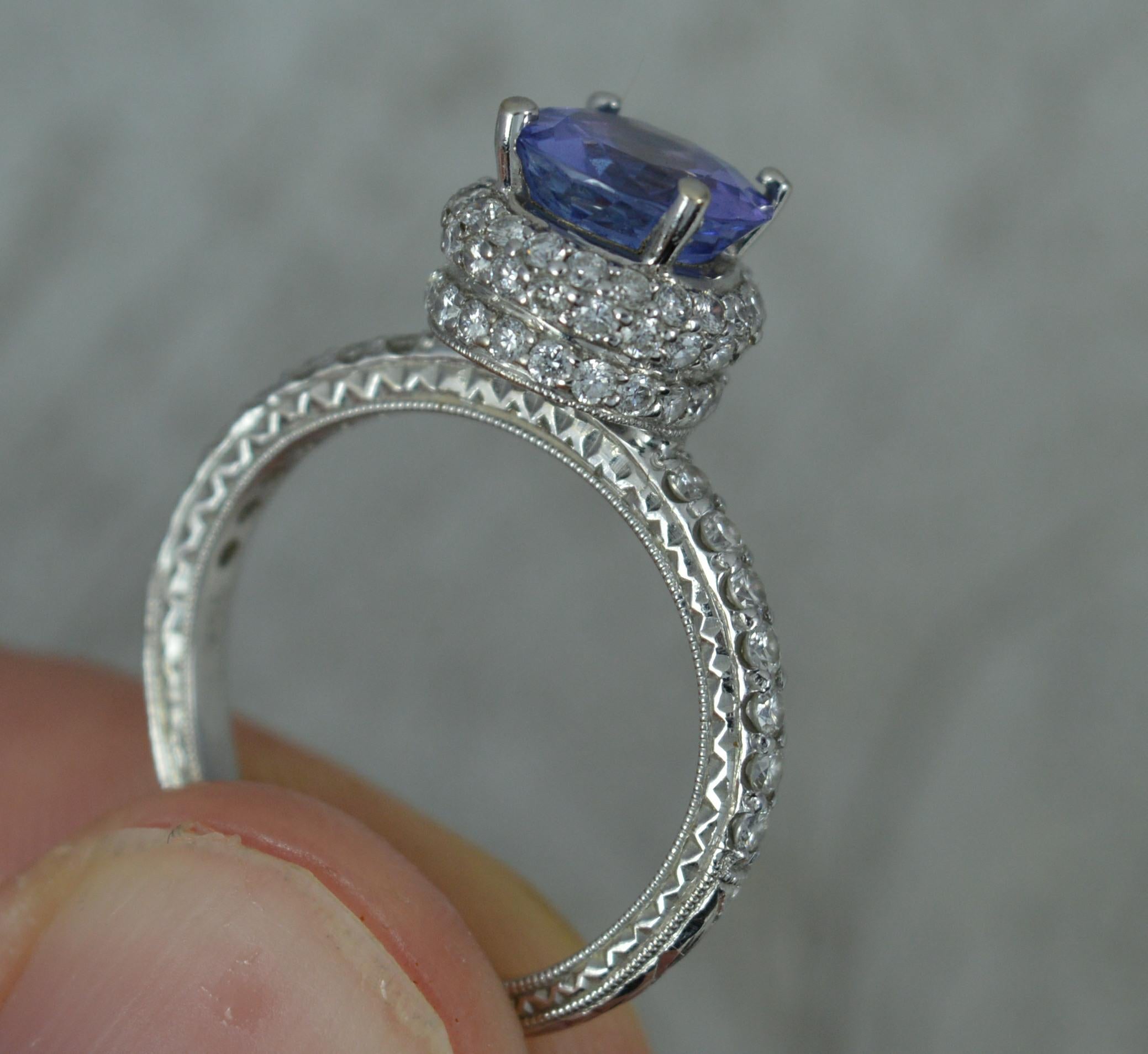 Superb 18ct White Gold Tanzanite and 0.75ct Diamond Halo Engagement Ring For Sale 1