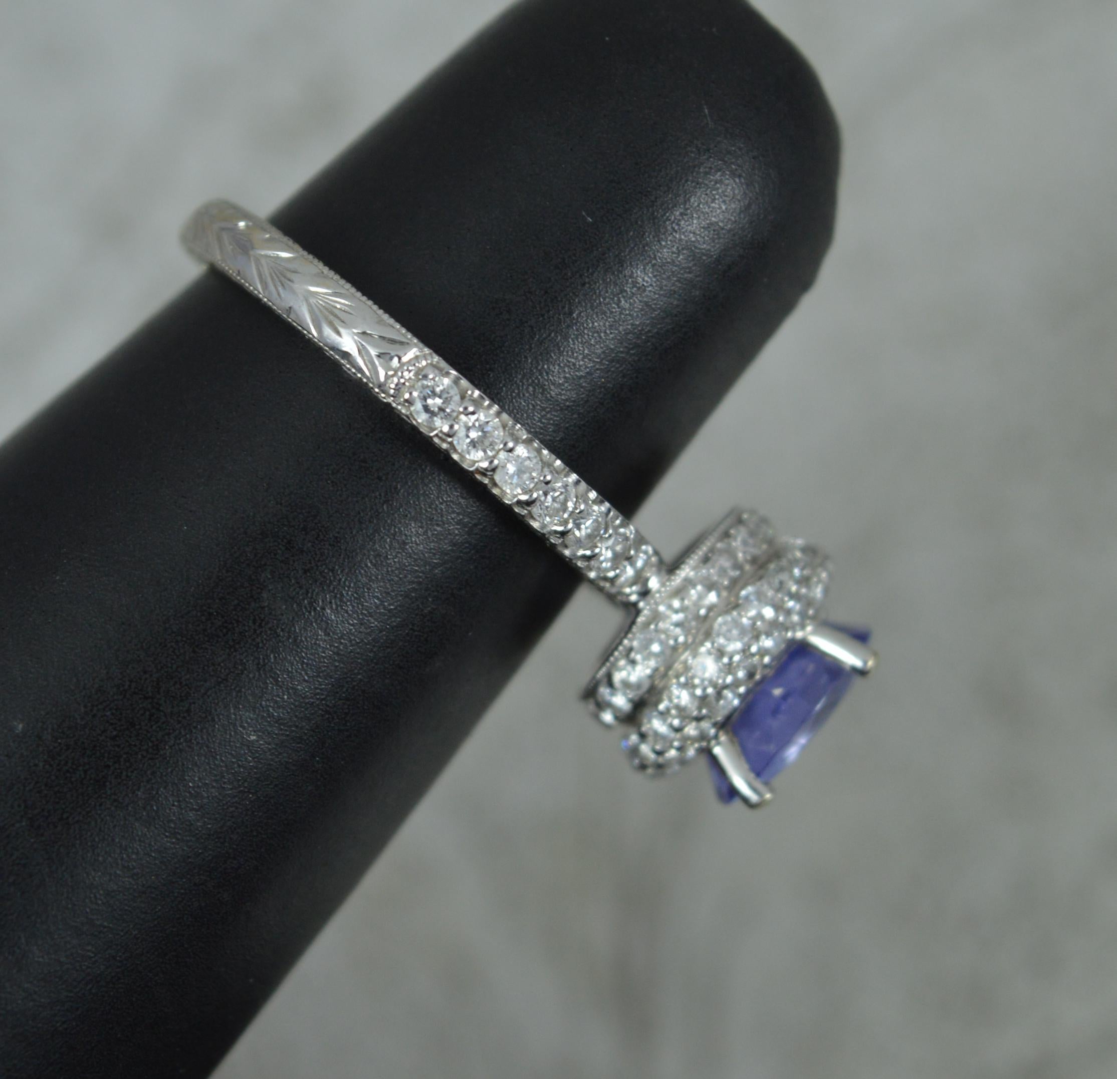 Superb 18ct White Gold Tanzanite and 0.75ct Diamond Halo Engagement Ring For Sale 3