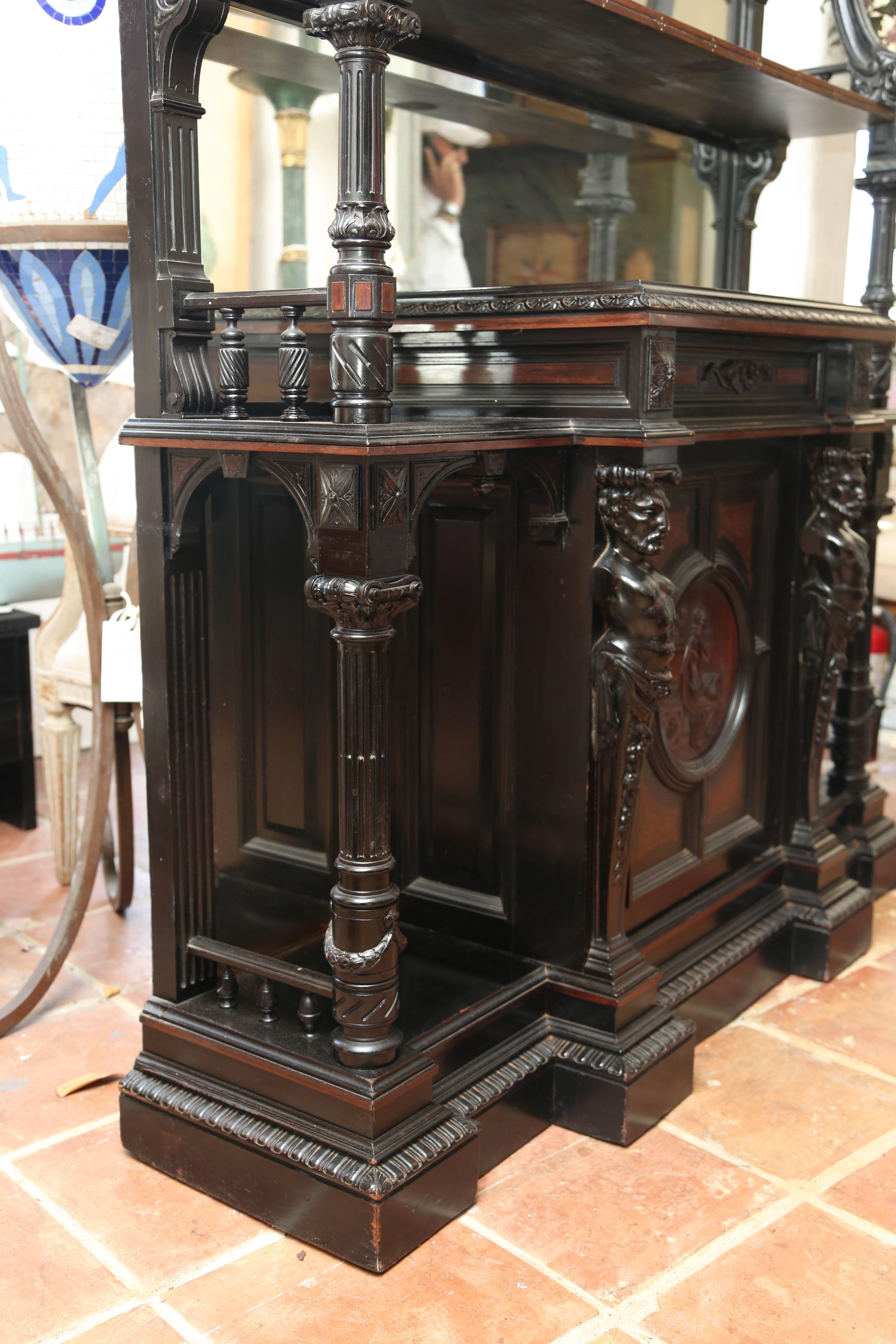 This is an amazing piece of furniture which would go in any room of a house even as a hall piece.
There are carved men figures to the base lion head carved faces to the top, with a lovely centre panel of a lady to the centre drawer.
There is a
