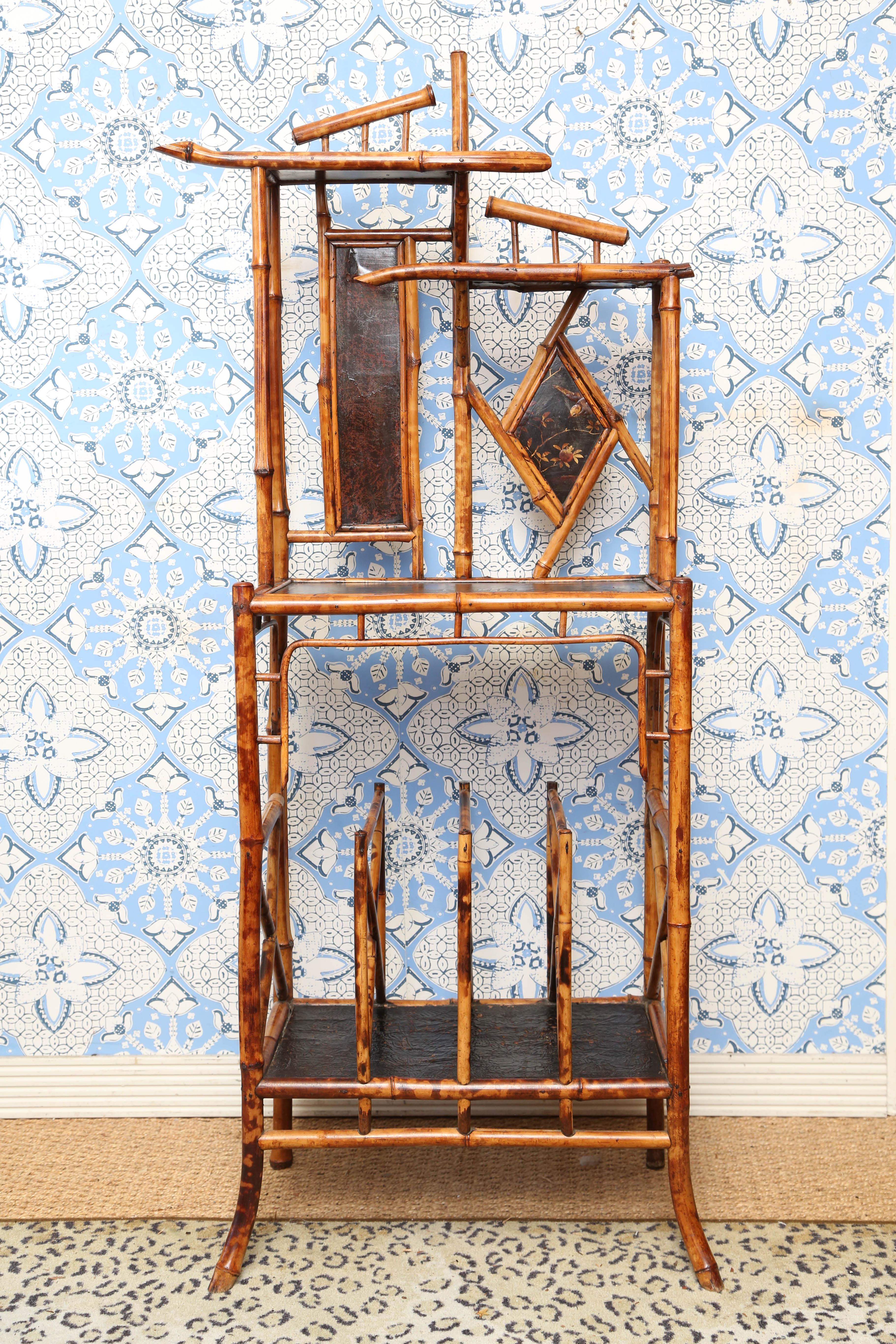 Superb 19th century English Bamboo Magazine rack with tabletop with Japanese figurines and leather paper.