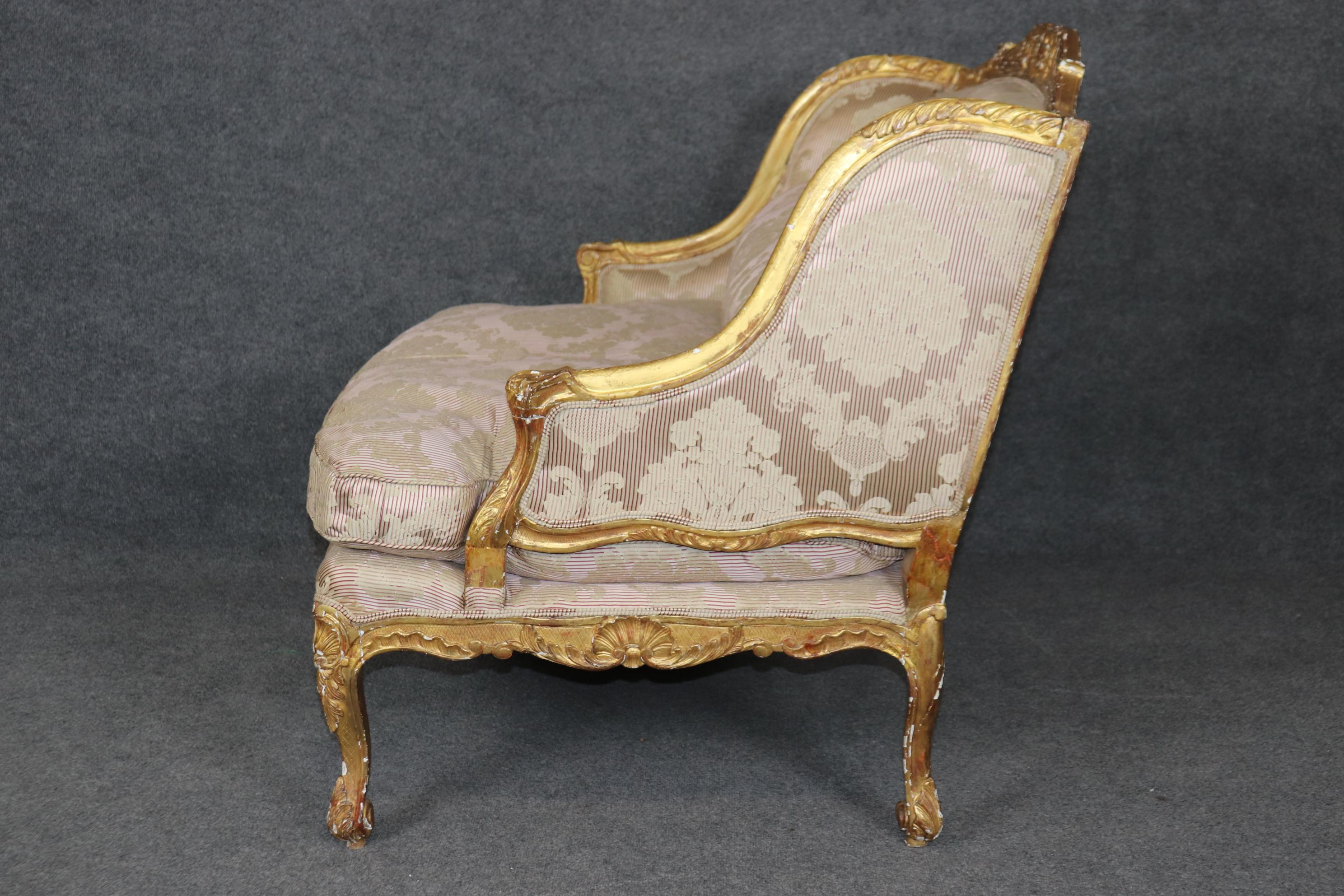 Late 19th Century Superb 19th century French Gilded Louis XV Style Marquis Bergere Chair  For Sale