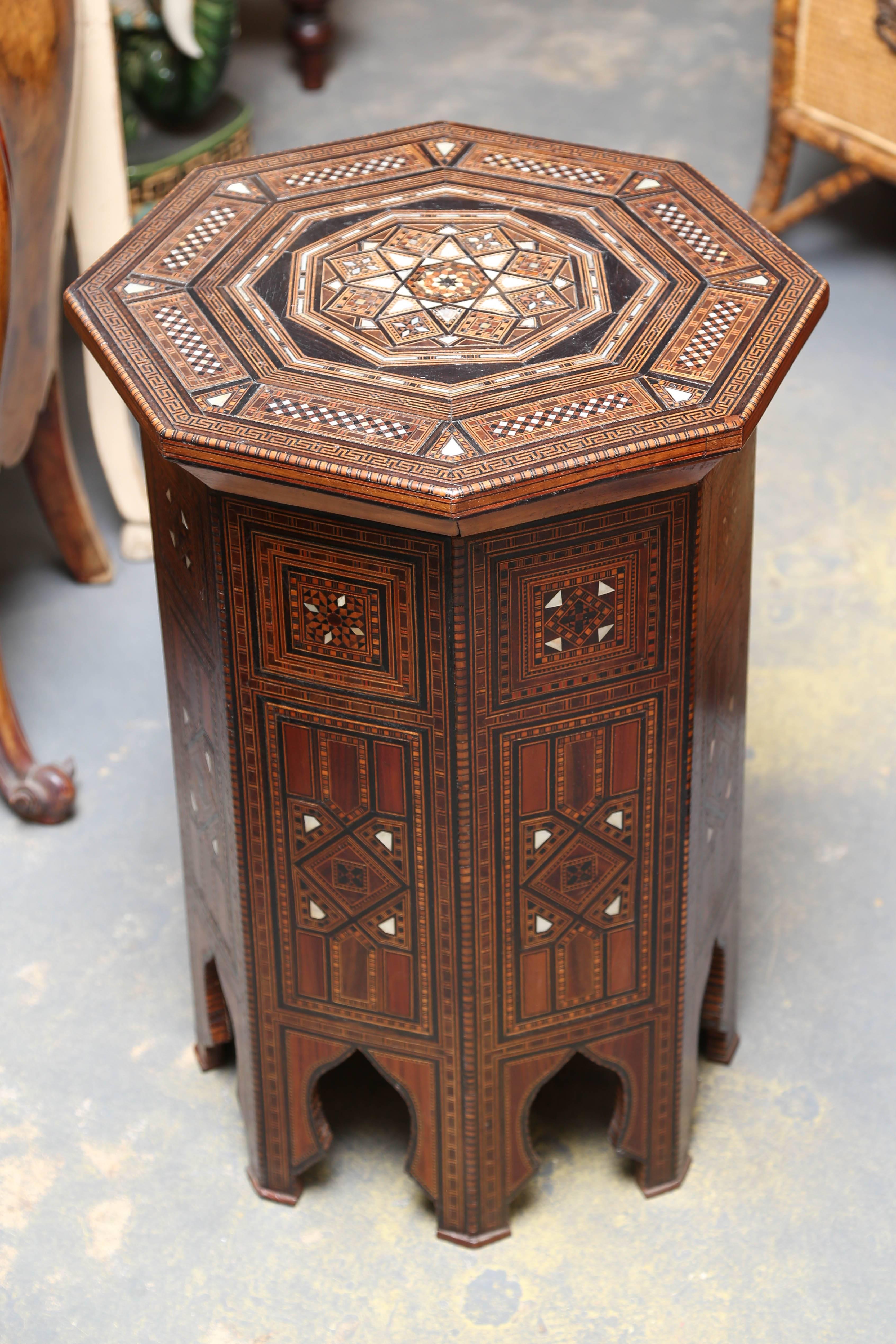 An outstanding example, tall, and nicely scaled with 1,000s of pieces of fine inlay.
The top is inlaid with a dramatic star.
 