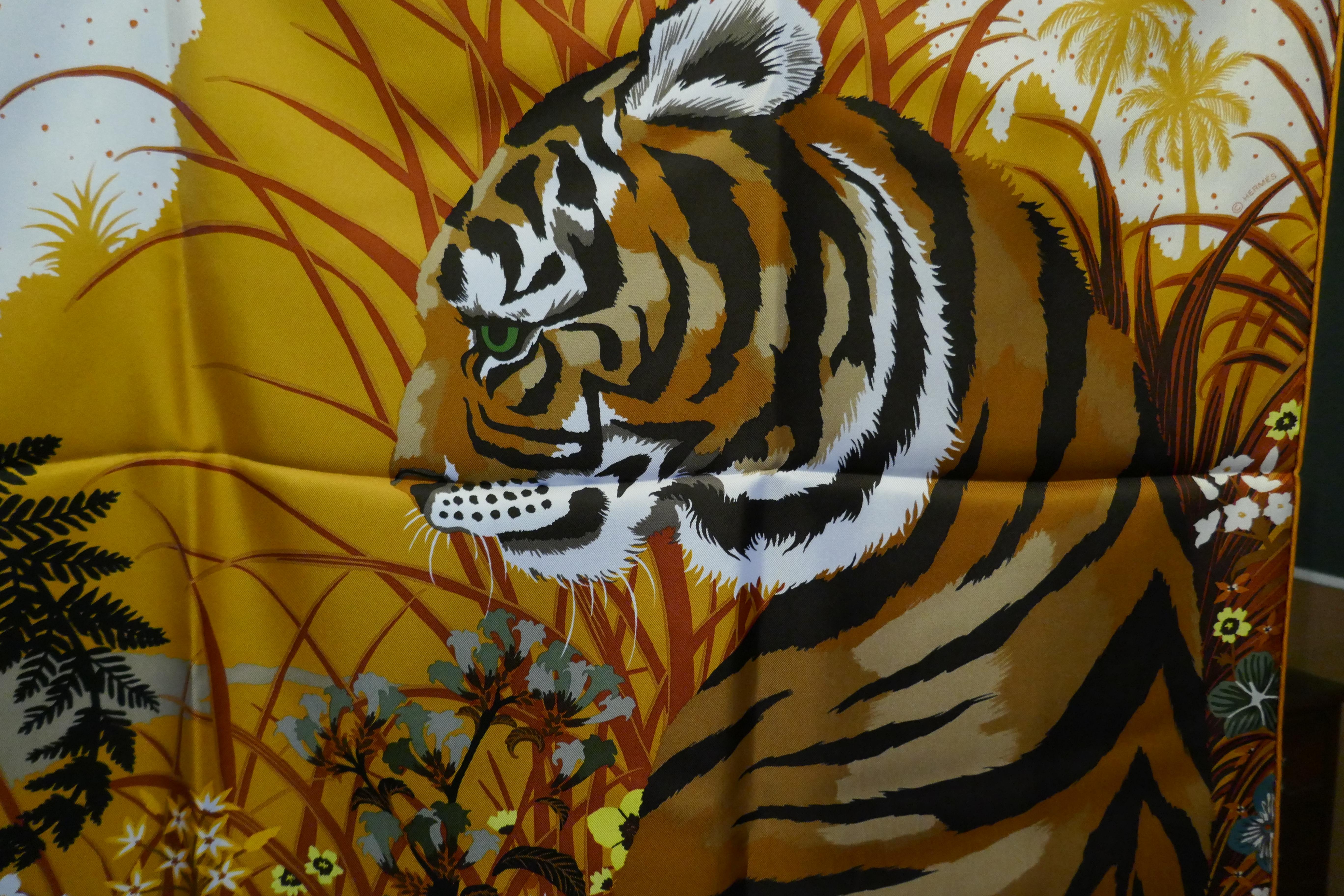 Superb 2015 Hermes Silk Scarf “ Tyger Tyger ” by  Alice Shirley

Authentic un worn original Hermes Silk Scarf, in a warm Brown and Gold Pallet
This is an exquisite and well loved design, this scarf is from 2015
Un used, as new and safely stored away