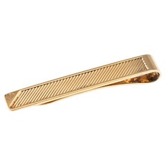 Superbo fermaglio Dunhill del XX secolo in argento massiccio placcato in oro c.1985