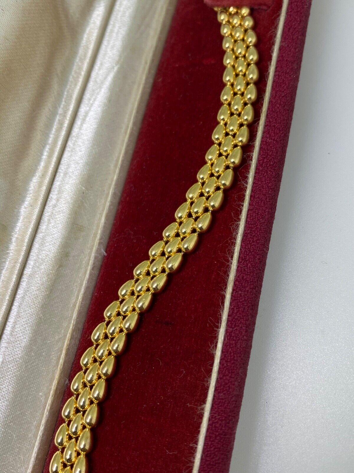 Hervorragendes italienisches Panther-Gliederarmband aus 9 Karat Gelbgold, ca. 2000er Jahre. Neuwertiger Zustand. für Damen oder Herren im Angebot