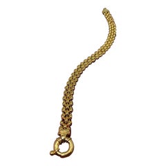 Hervorragendes italienisches Panther-Gliederarmband aus 9 Karat Gelbgold, ca. 2000er Jahre. Neuwertiger Zustand.