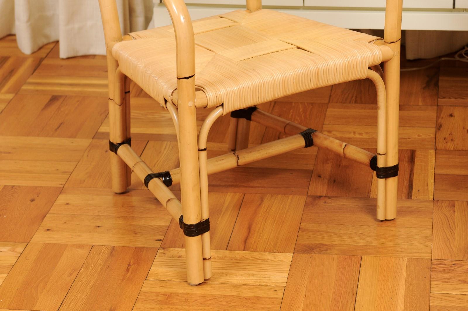 Pelle Superbo set di 12 sedie in rattan di canna merbau ALL ARMS di John Hutton per Donghia in vendita