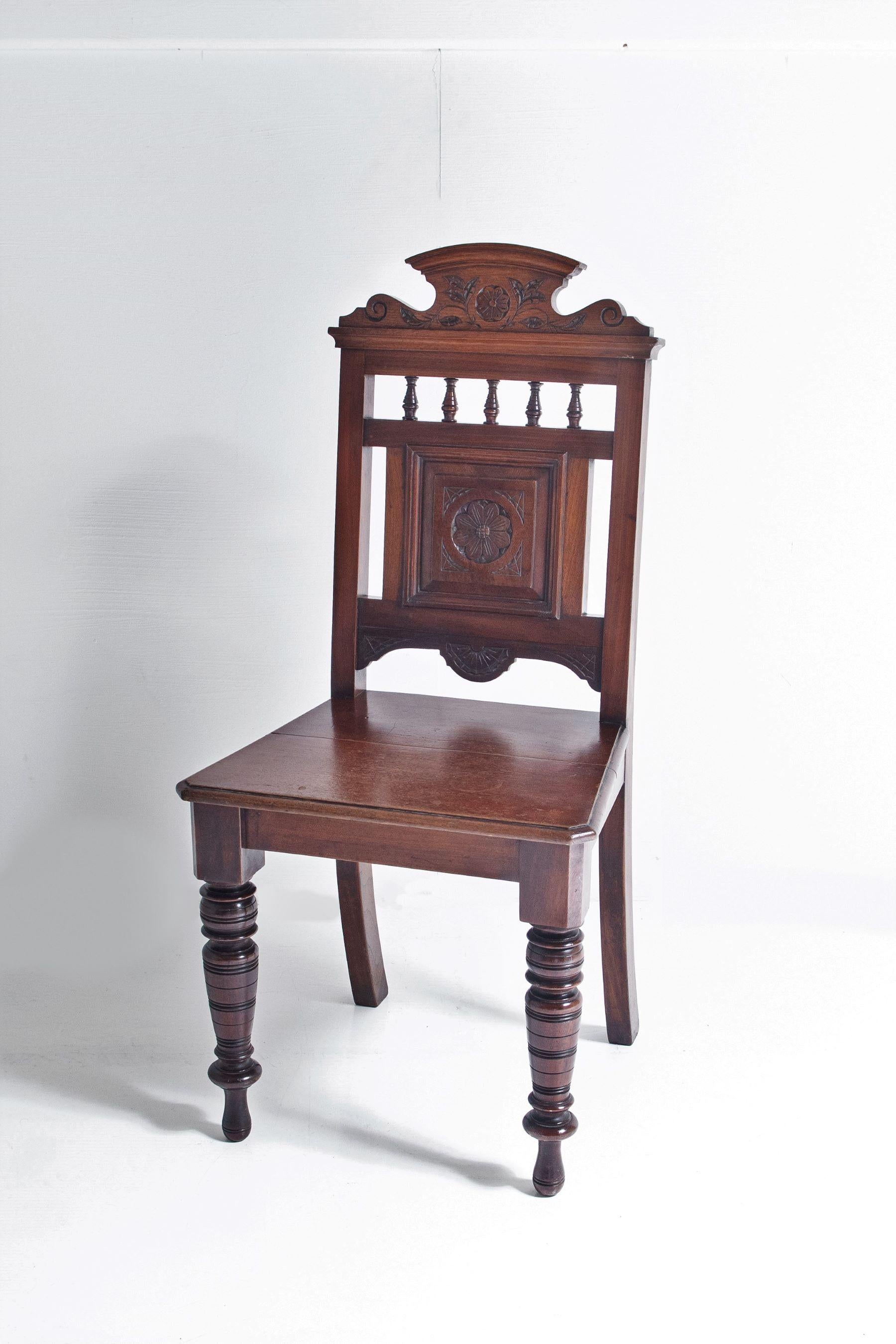 A beautifully crafted Aesthetic Hall Chair, carved foliage and scroll detailing with arched top. Lovely turned front legs with the most superb narrow bobbin front feet.
Solid oak with mixed hardwood, in a rich deep colour with lovely wear.
A small
