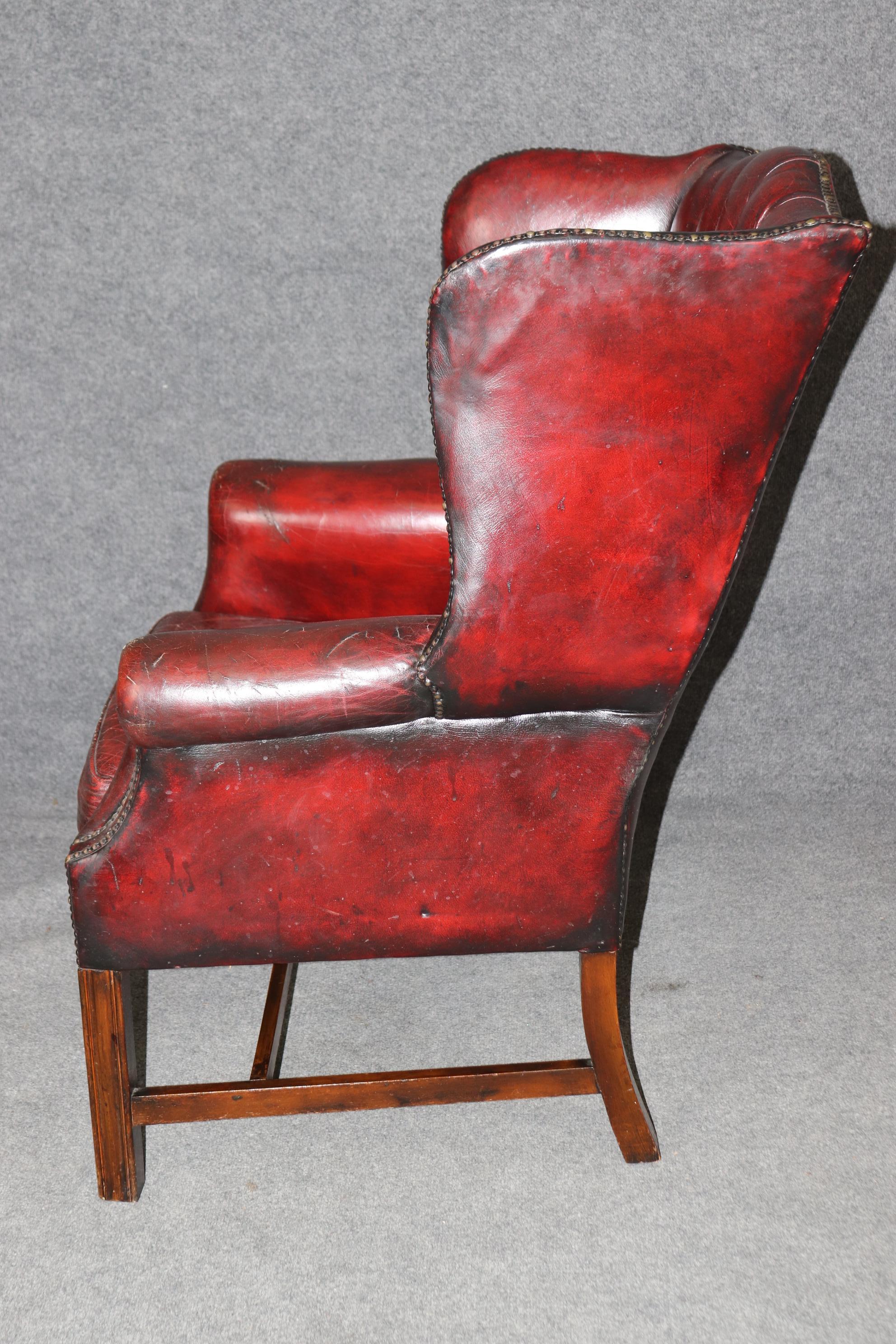Georgian Superb Antique English-Made Tufted Leather Chesterfield Wingback Wingchair For Sale