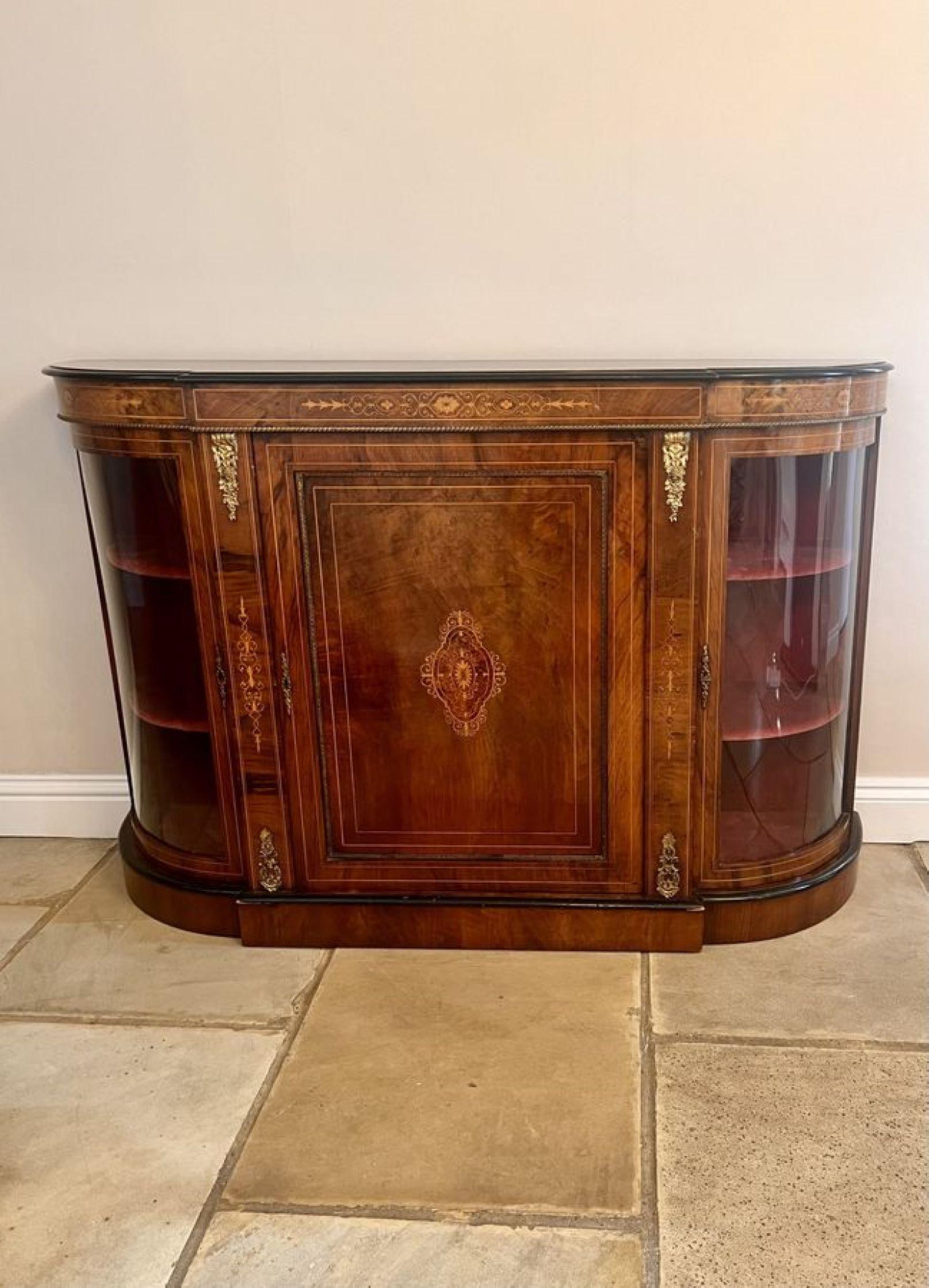 Superb antique Victorian quality burr walnut inlaid credenza, having a quality burr walnut shaped top with an ebonised moulded edge above a shaped burr walnut inlaid frieze, single burr walnut inlaid door to the centre with ormolu mounts opening to