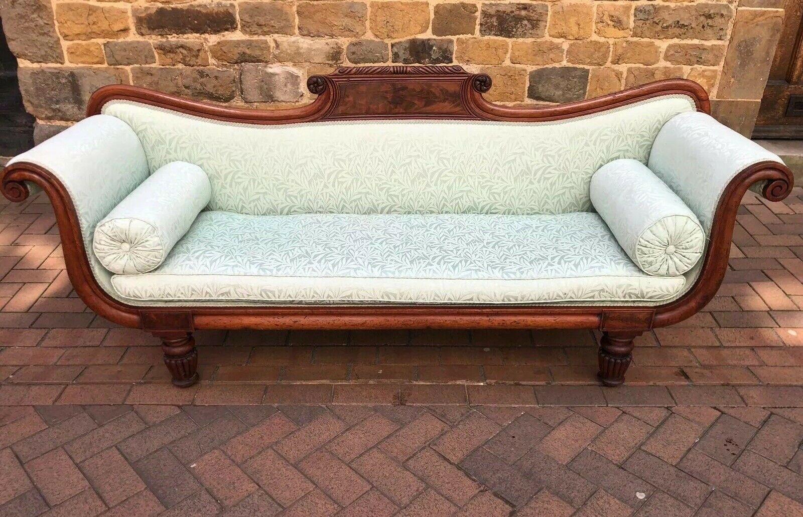 This superb William IV sofa is of fine quality and elegant form.

It comprises of a mahogany frame and features a shaped and carved top rail, scrolled arms and fluted legs.

The recently reupholstered light mint green silk fabric has a beautiful