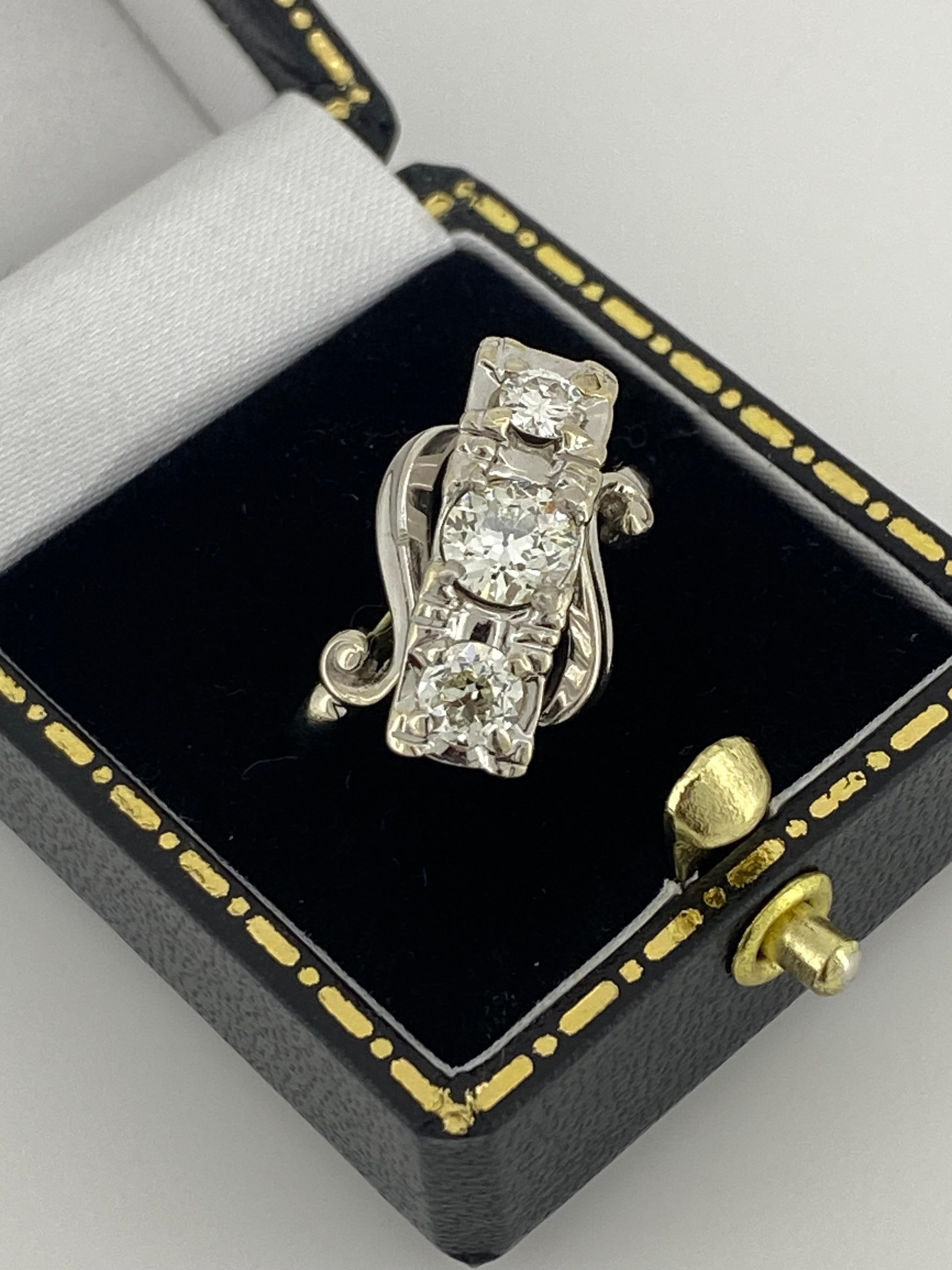 
This stunning piece of jewellery

is dating back to an Art-Deco period - circa 1930's, 

yet it's in beautiful condition & 

of rather unusual rarely seen design 

 

~~

 

Featuring 3 Natural Old-European Cut Diamonds, 

which are rare & sought