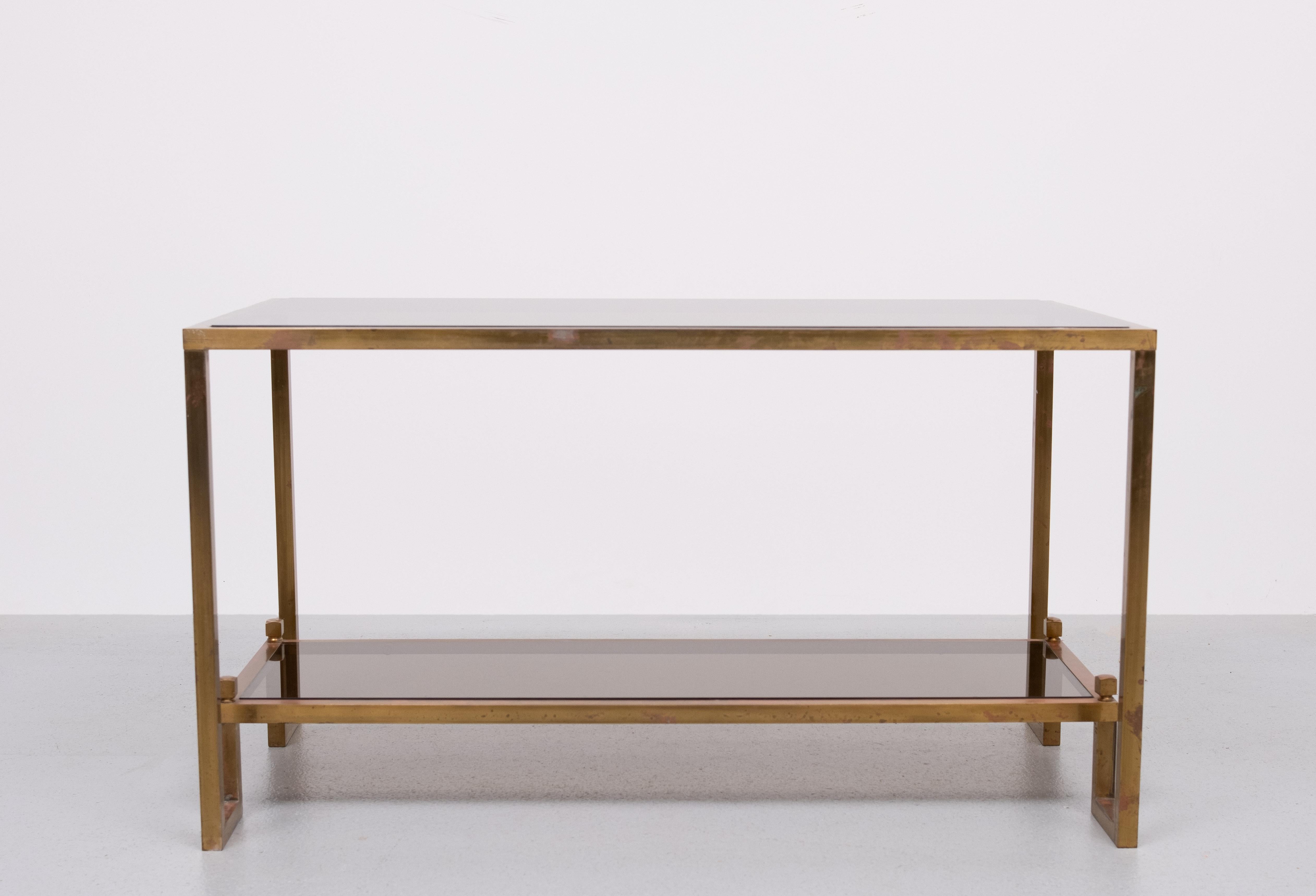 Superb Bronze coffee table .Love the u shaped legs .comes 
with thick smoked Glass tops . Beautiful red Gold and Green Patine .
1960s 

Please ask for cheaper shipping solutions .
 