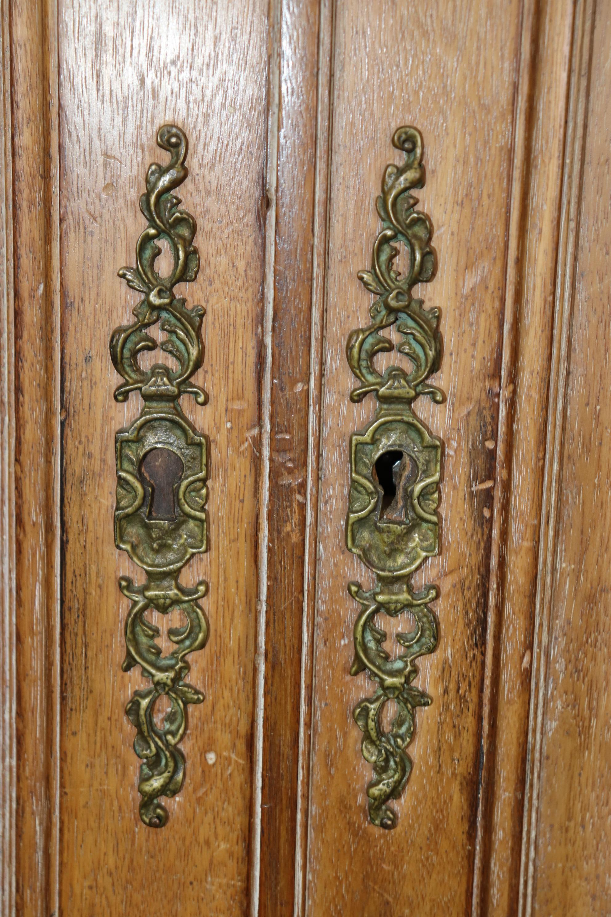 Superb Carved French Auffray Style Louis XVI Limed Walnut Armoire with Wreath For Sale 7