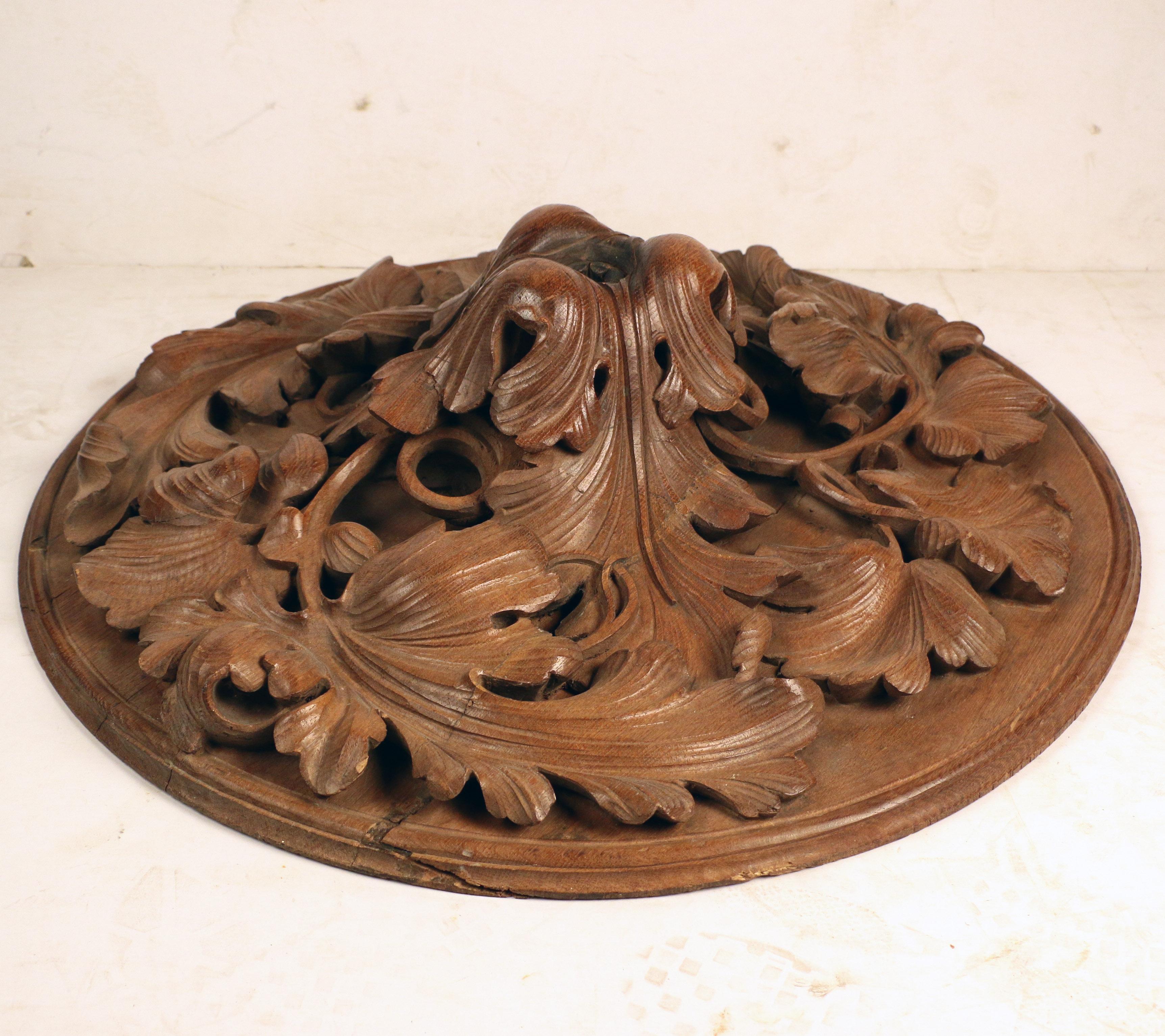This unique piece came originally from an Ottawa mansion. Carved in the last quarter of the 19th century, it is the only such item we have ever handled. It is profusely and naturalistically carved in deep relief with leaves and tendrils. It must