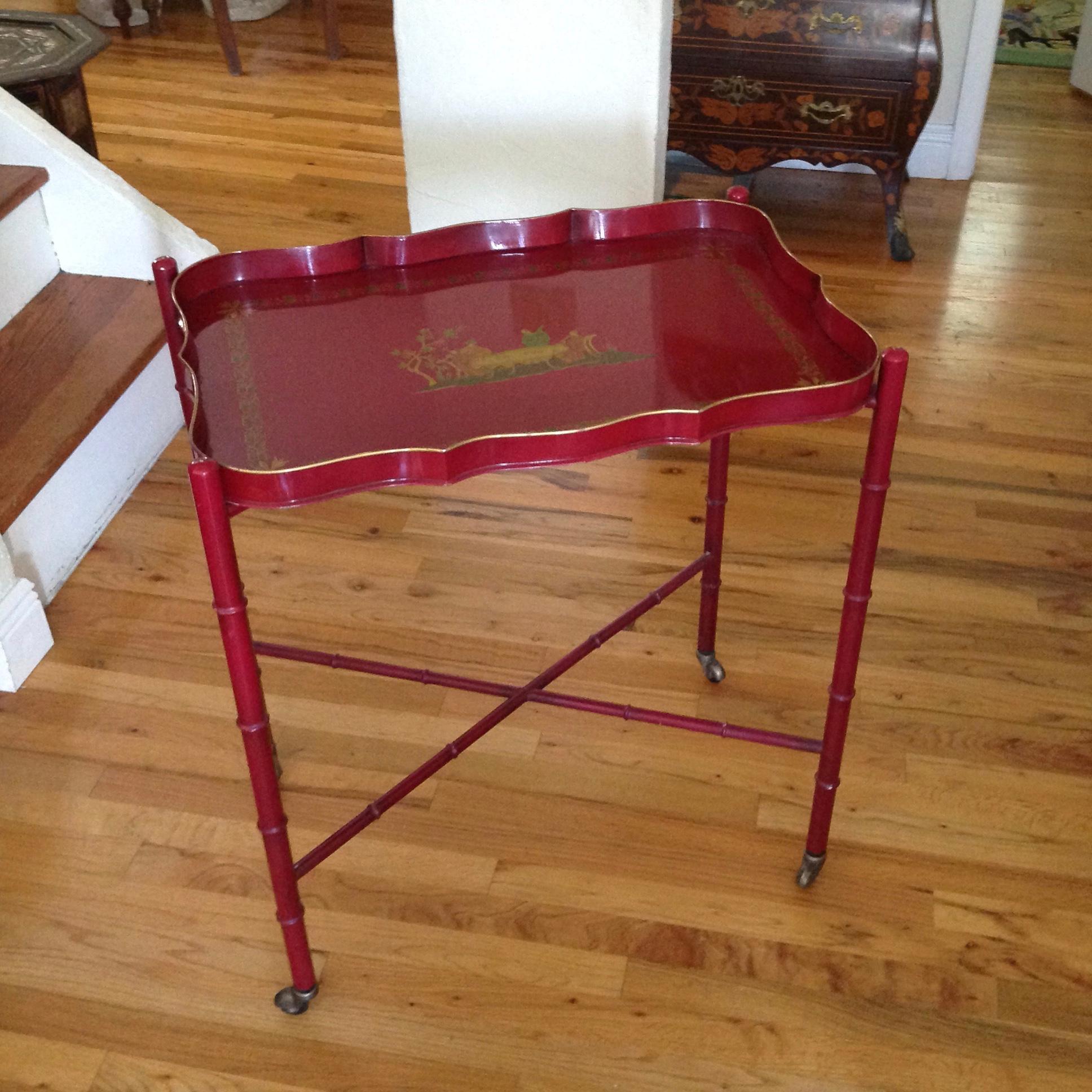 Bar cart height, with outstanding gold pen work against the red background.
Tray (26