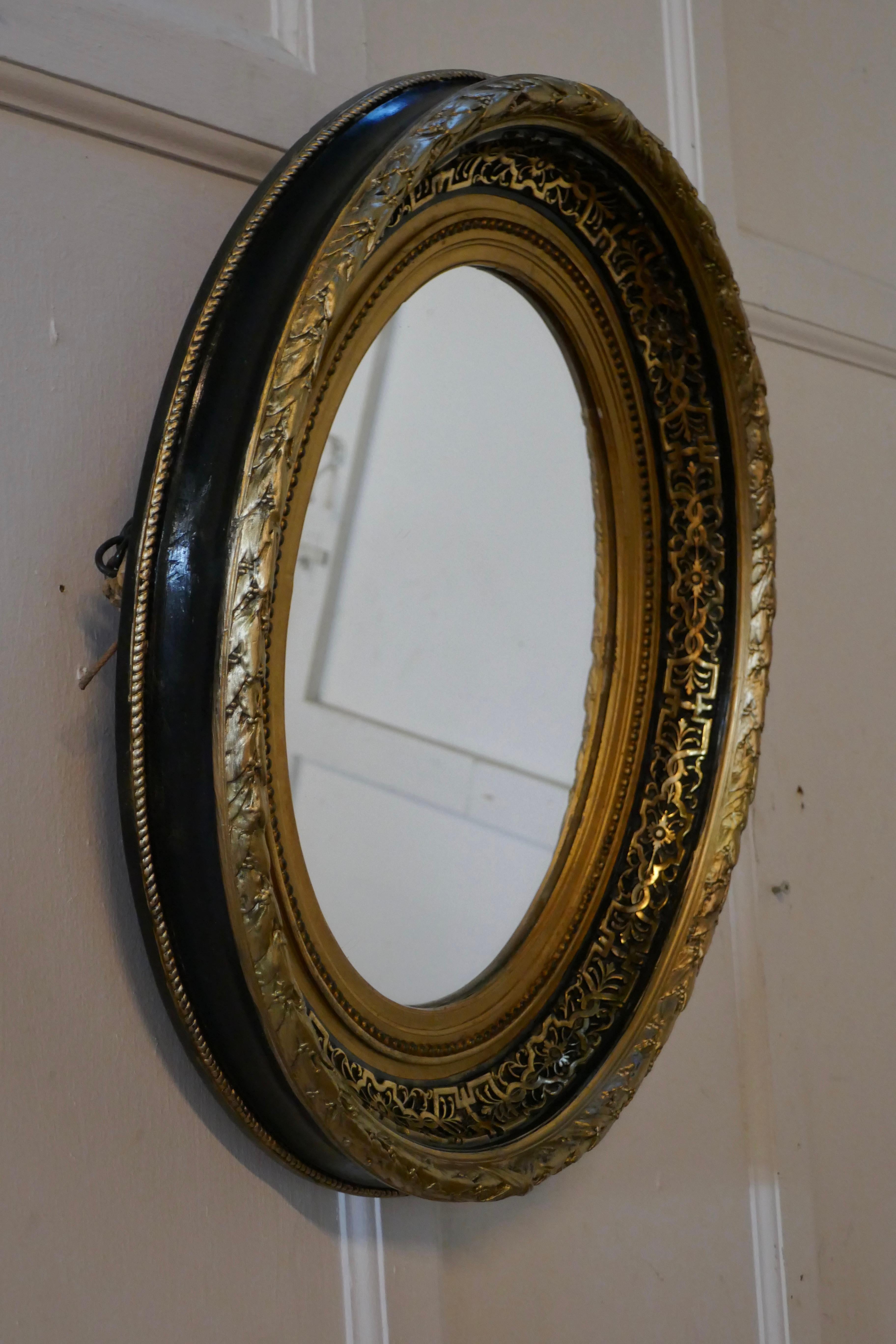 Superb Deep Oval Frame French Empire Gilt and Lacquer Wall Mirror 2