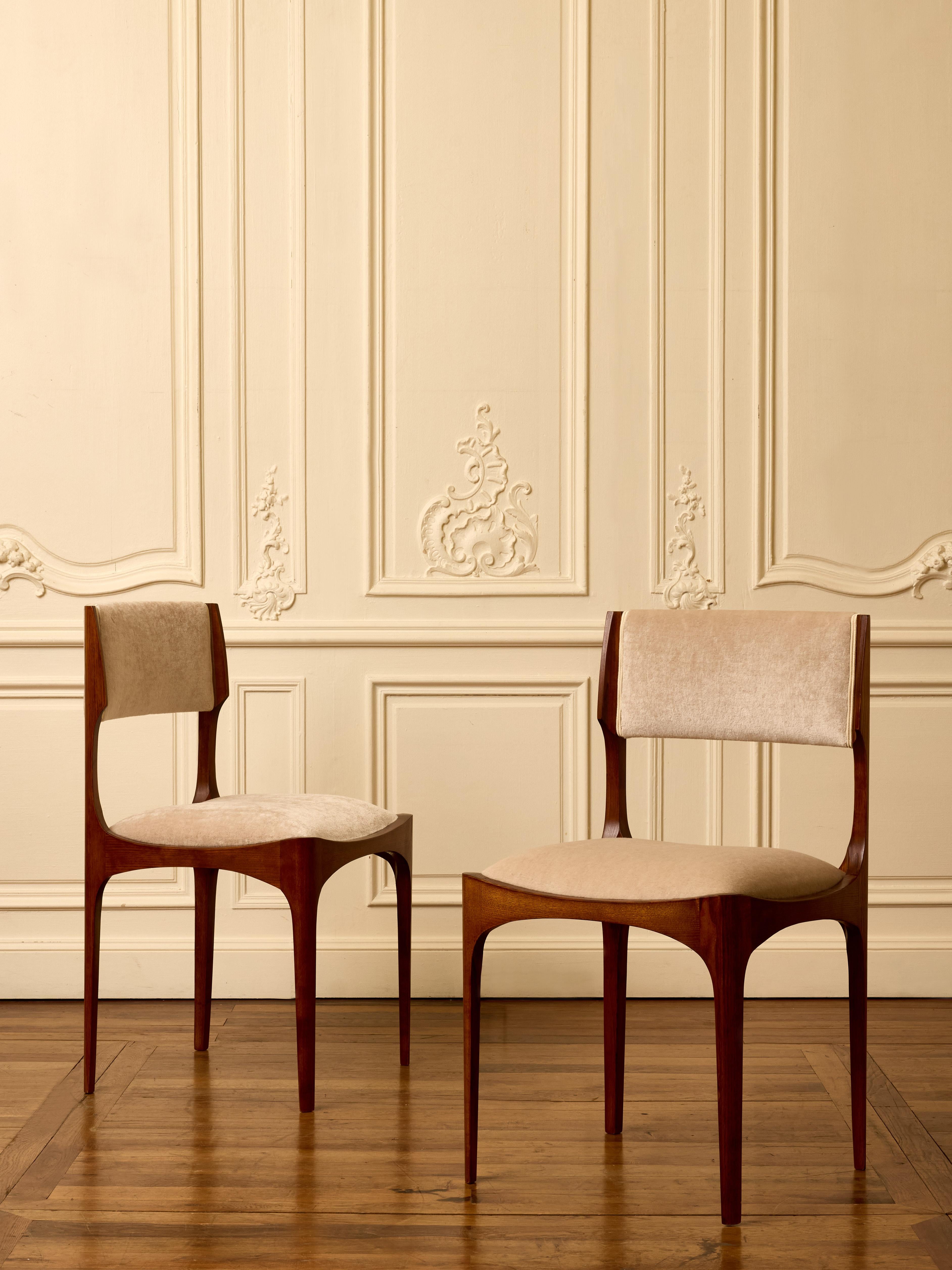 Dining chairs in ash wood upholstered with a Mohair velvet by Elitis.
Italy, 2025