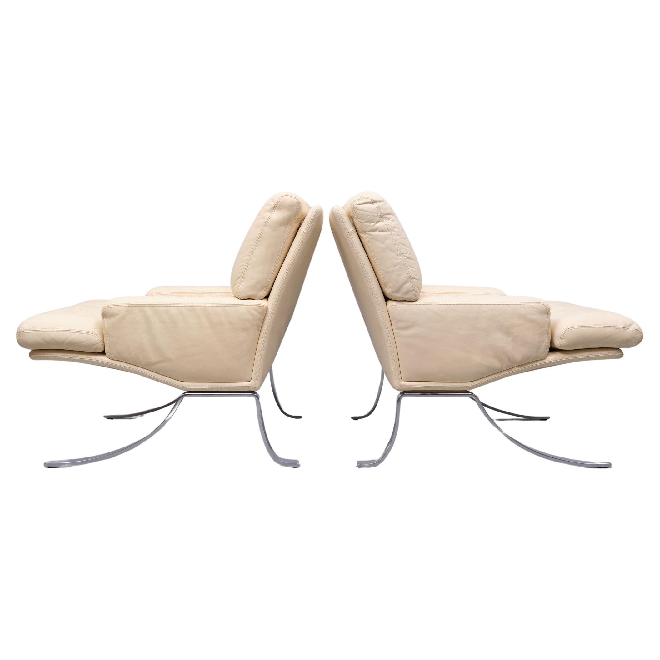 Superb set of Lounge Chairs and ottoman . Manufactured by Durlet Belgium 1970s 
Ivory color Leather ,on a Chrome on Steel base . Very good seating comfort .
Super rare . Looks like something from the Thunderbird's . so stylish . 
Heavy in weight .  