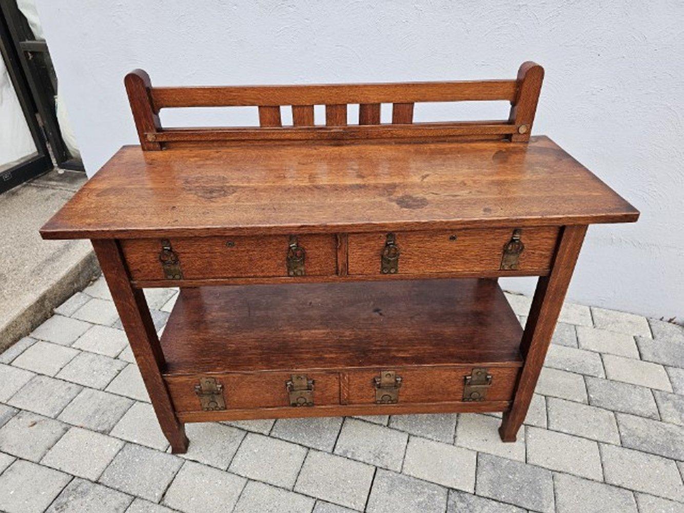 SUPERB Early c. 1904 Stickley Brothers Serving Table - W7482

This serving table came from an important era of furniture made by the Stickley Brothers in Michigan.  Stickley Brothers had a decorator on staff and, for a time, made furniture in a