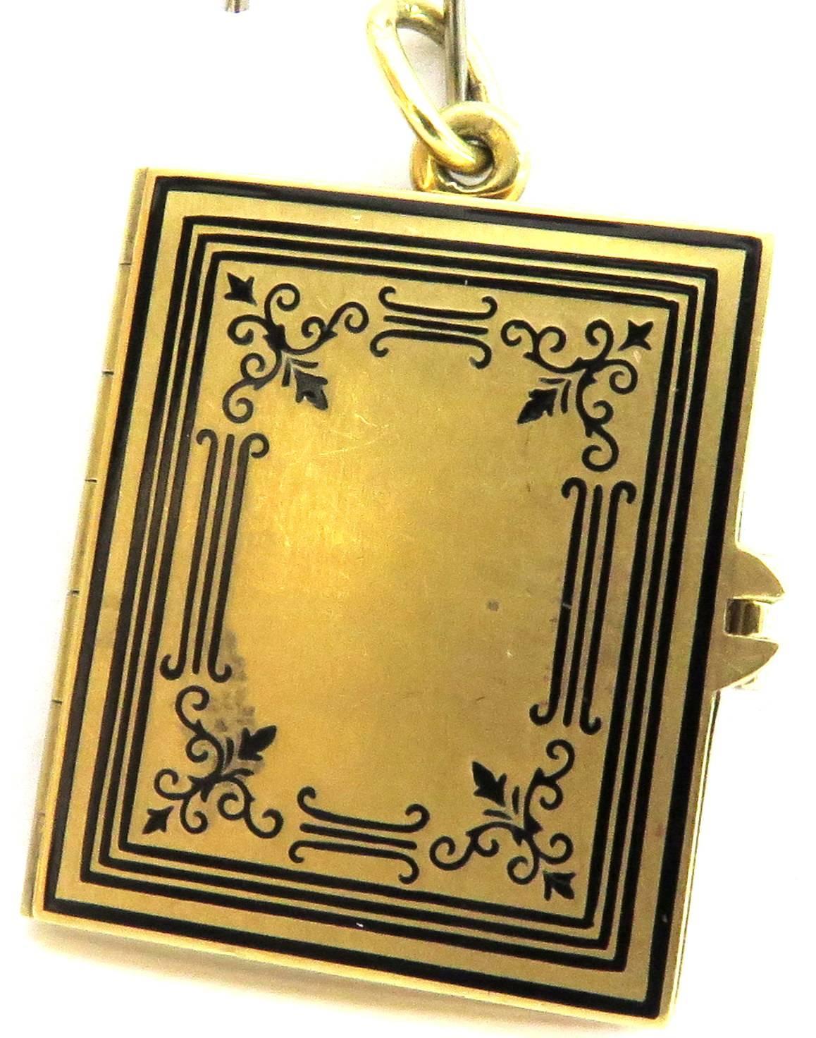 This wonderful charm, pendant, locket, has the most beautifully detailed enamel I've ever seen. The enamel is on the front & back of this charm. There are 3 pages that can be engraved or you can put pictures inside. 
This charm, when closed measures