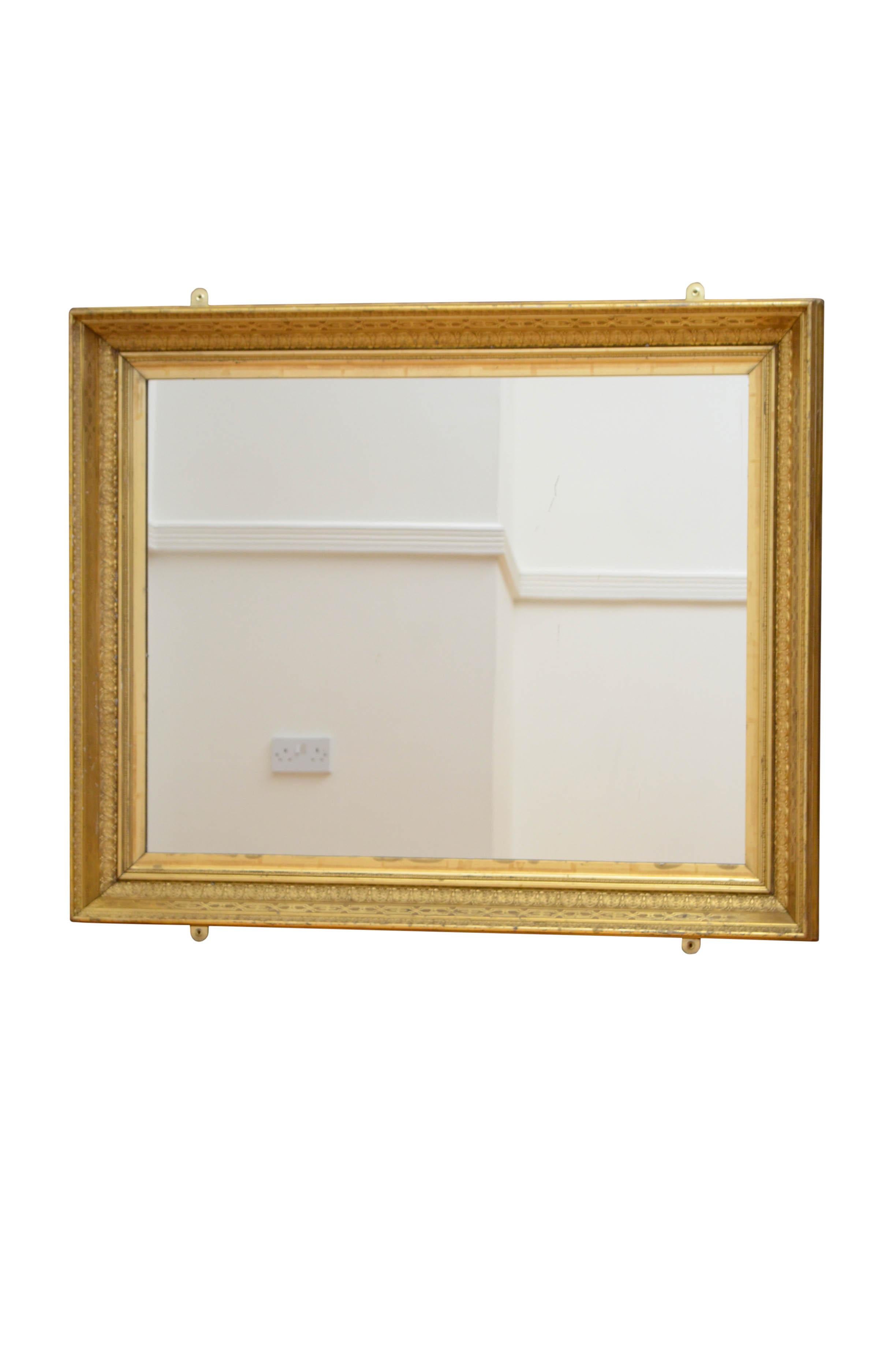 Superb 19th century giltwood wall mirror of versatile form, can be positioned horizontally or vertically, having replacement glass in beautifully carved and moulded gilded frame. This antique mirror retains its original gilt throughout, all in