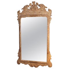 Superbe miroir sculpté en bois doré et gesso de style George I