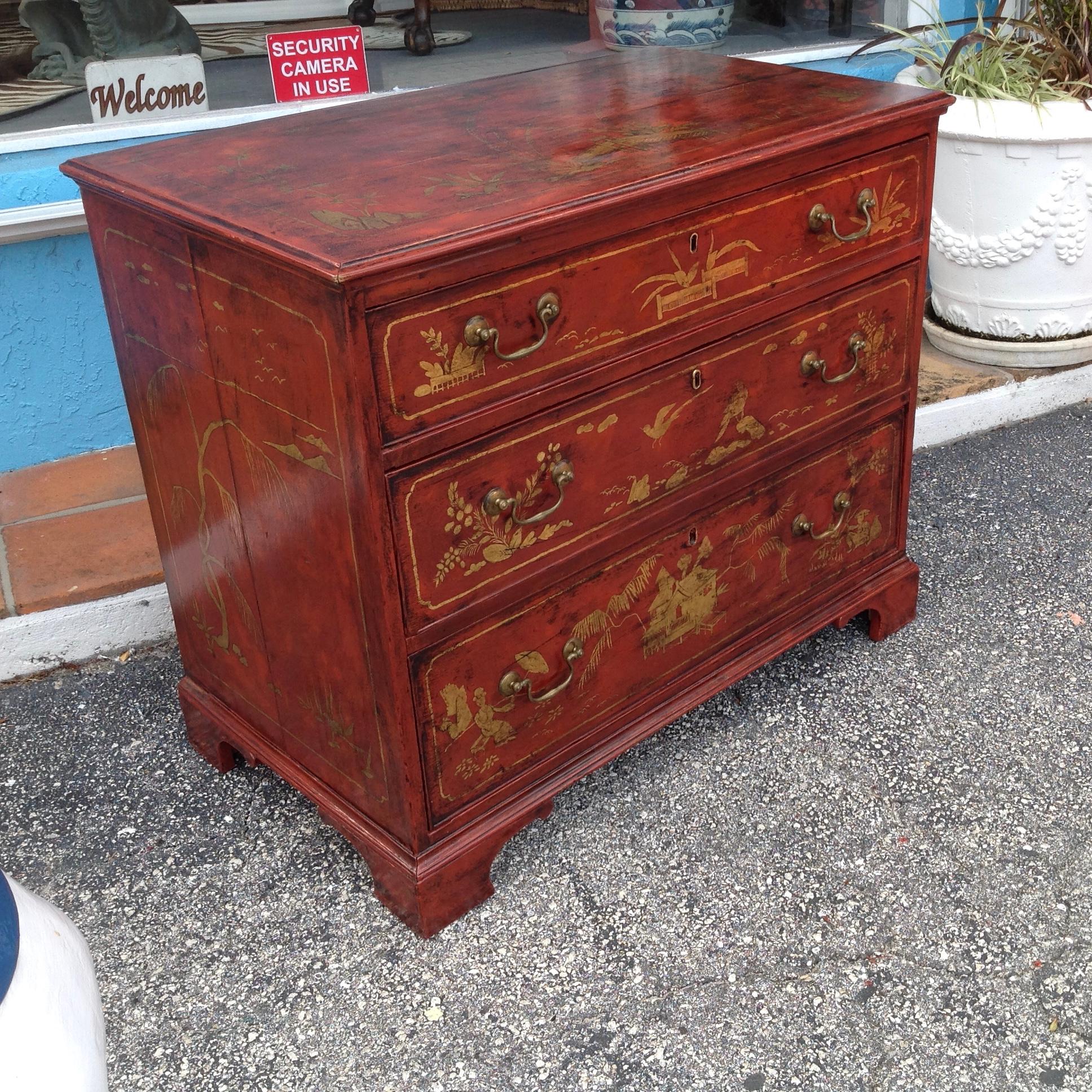 Exquisite quality and design.
Wonderful Chinese red background with fine gilt appointments 
featuring flora and birds.