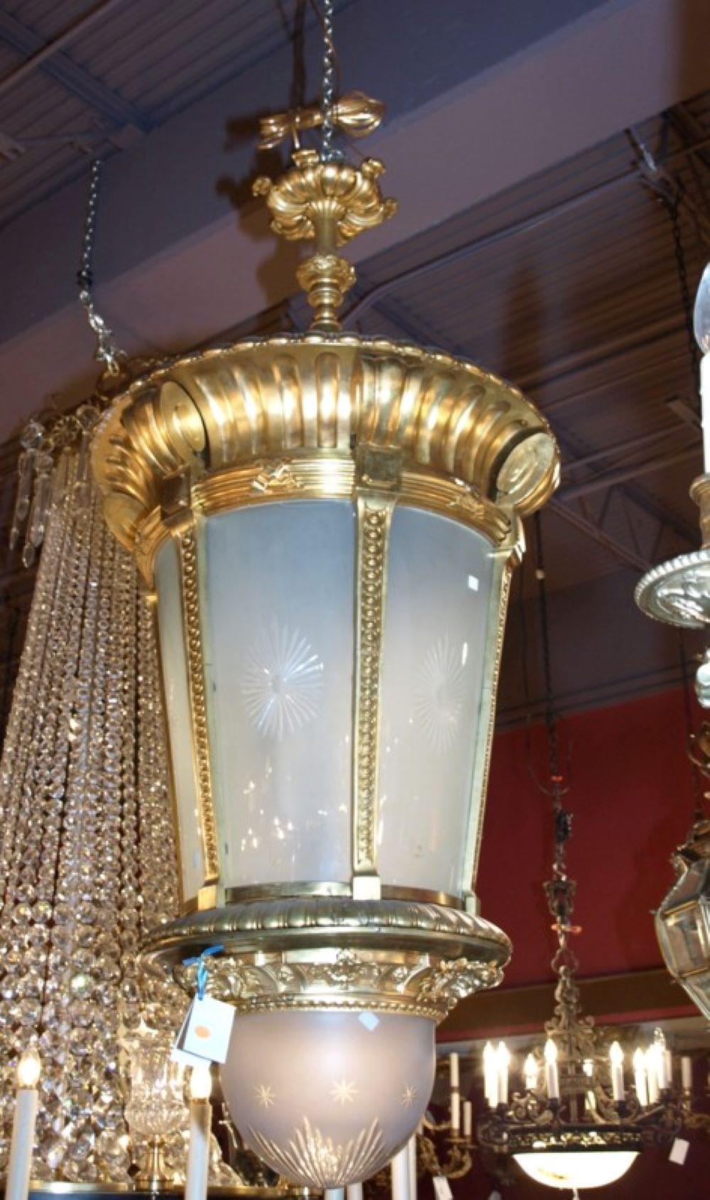 Magnificent gilt bronze lantern with frosted glass panels. 7 lights. 
France, circa 1900.
Dimensions: Height 62