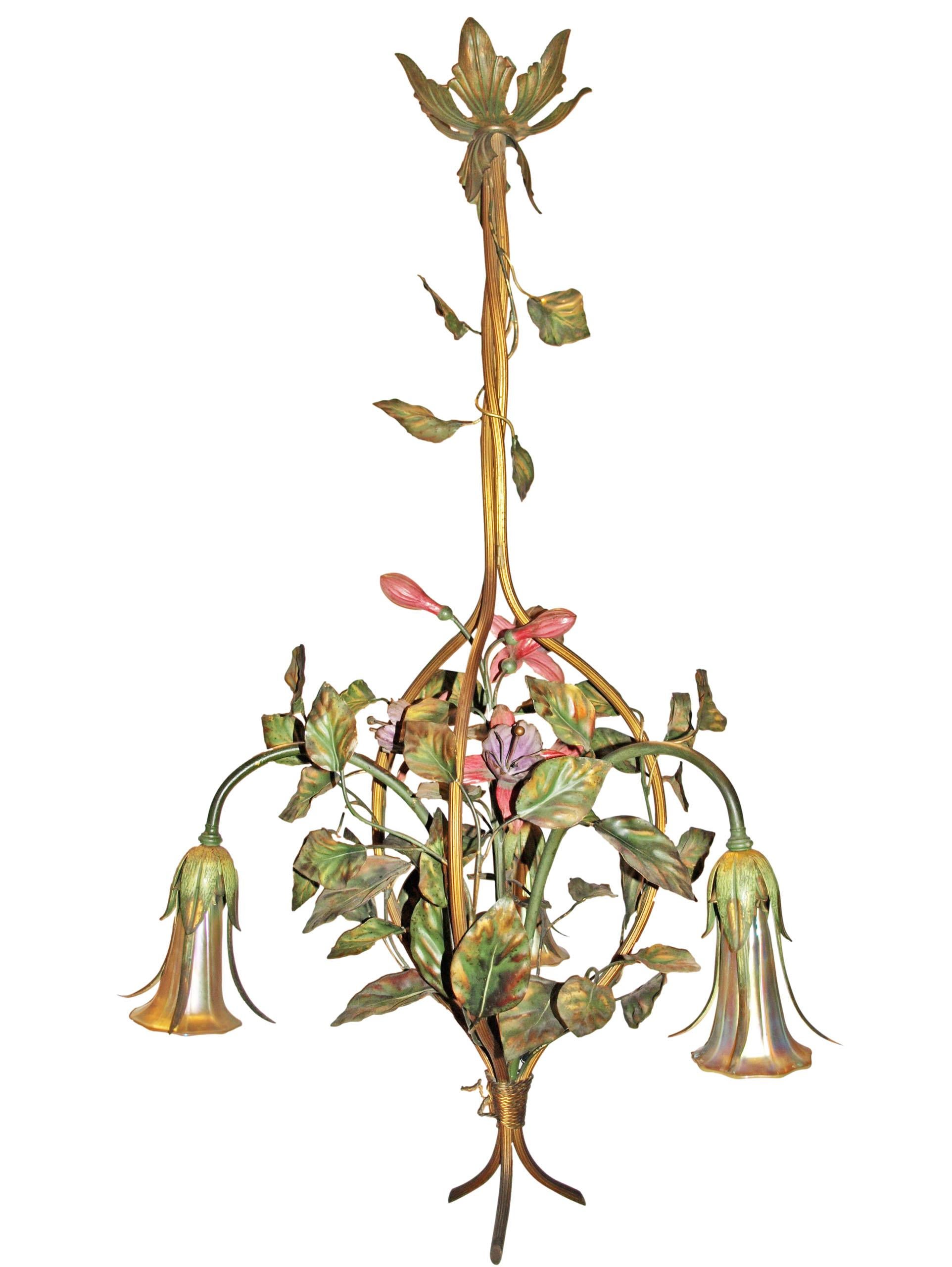 A superb hand painted and gilt Art Nouveau chandelier with art glass shades. 3 lights
Dimensions: Height 39