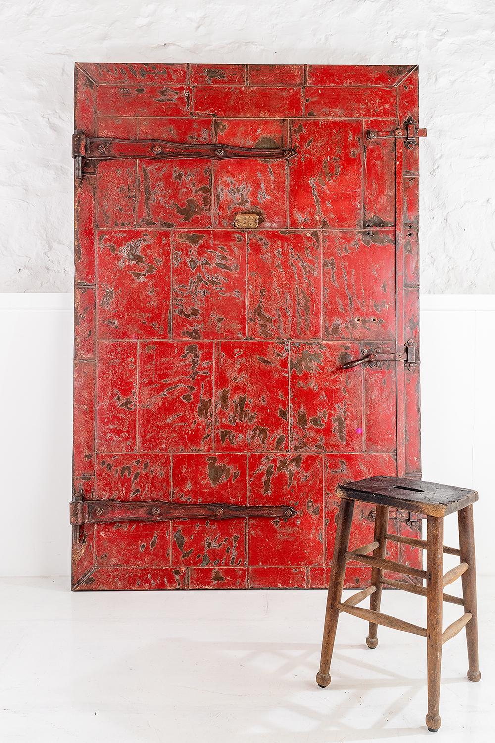 What a door!
Manufactured by Mather & Platt Ltd of Manchester, England.
The doors stands at over 7ft high and nearly 5ft wide, the steel patchwork is all intact and the door is finished in its original red paint with a wonderful aged patina. The