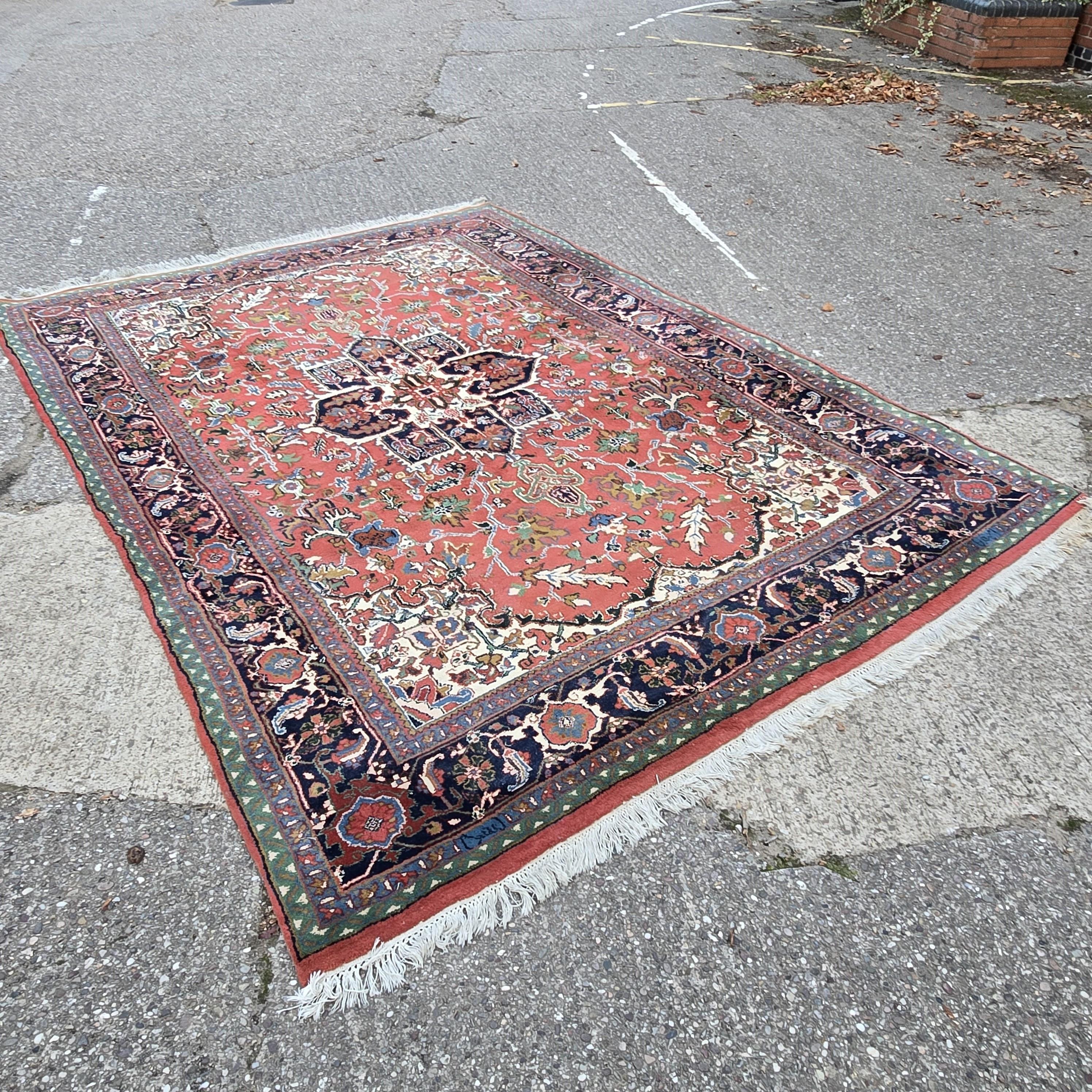 A very nice Oriental carpet of heriz design, super colours with no fading or ware to the central square, slight ware to fringing.

353cm x 256cm

You are welcome to view this item at our showroom, please phone ahead of visiting.
Please contact us
