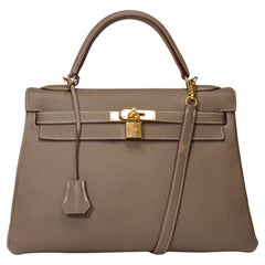 Superb Hermès Kelly 32 retourne handbag strap in Togo etoupe leather , GHW
