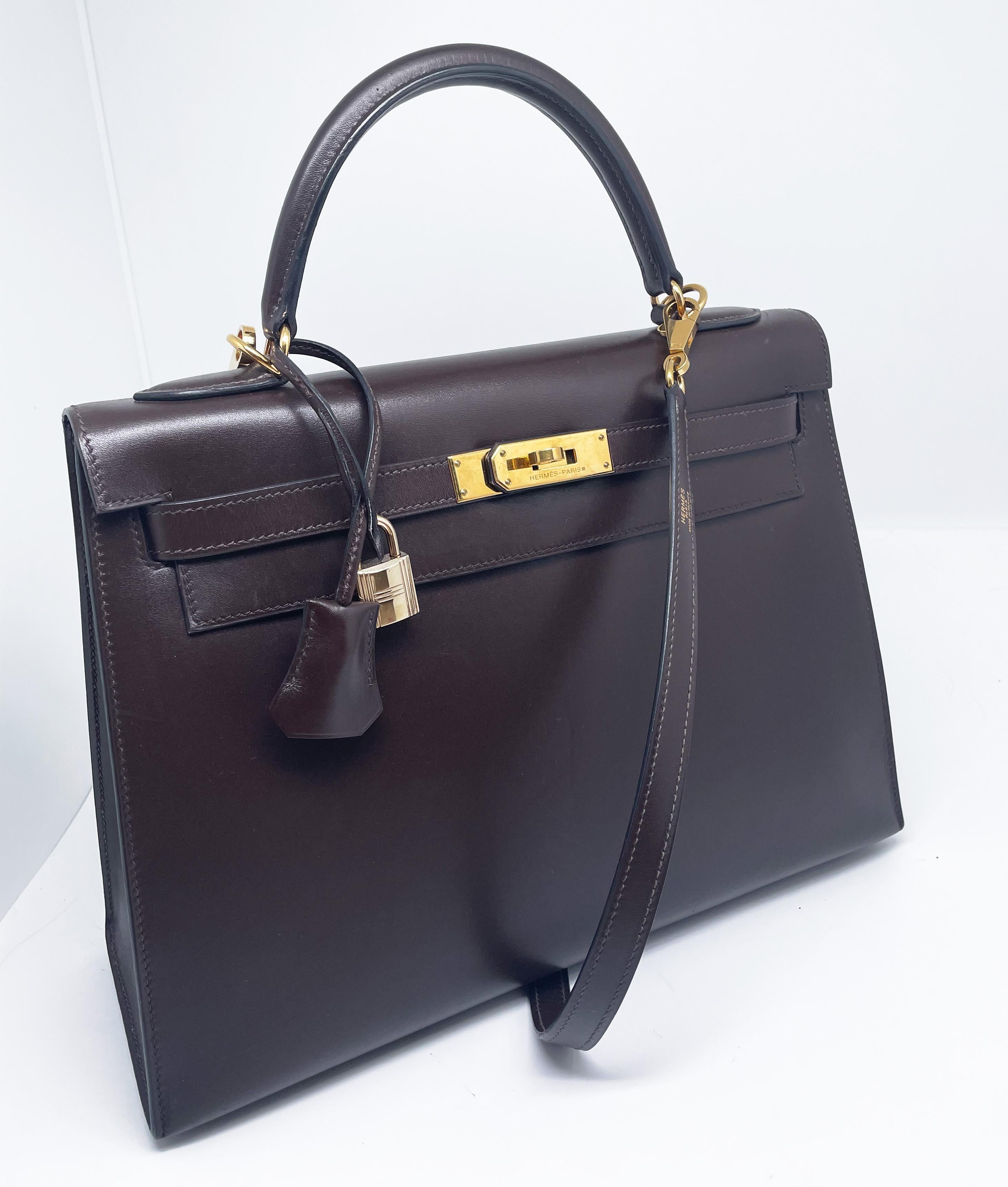 Black Superb Hermès Kelly saddler handbag 32 cm in brown box