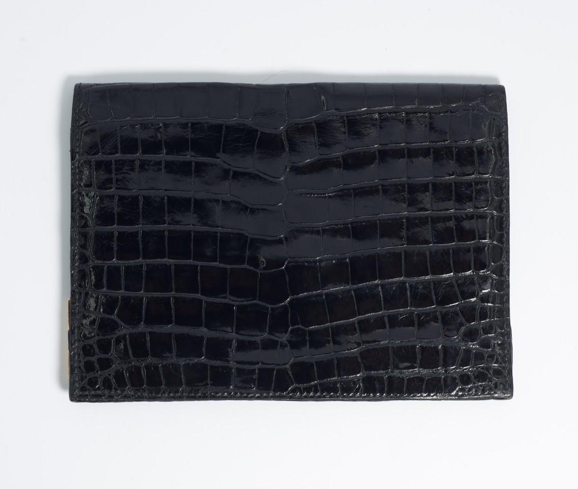 Superb Hermes Paris 1960s black African crocodile gold cornered wallet
fully lined in matching crocodile. Opens up end to end through the tab. Pockets for cards etc. Stamped Hermes Paris
Provenance of an Indian prince
Measures 6 x 4 and opened 8
