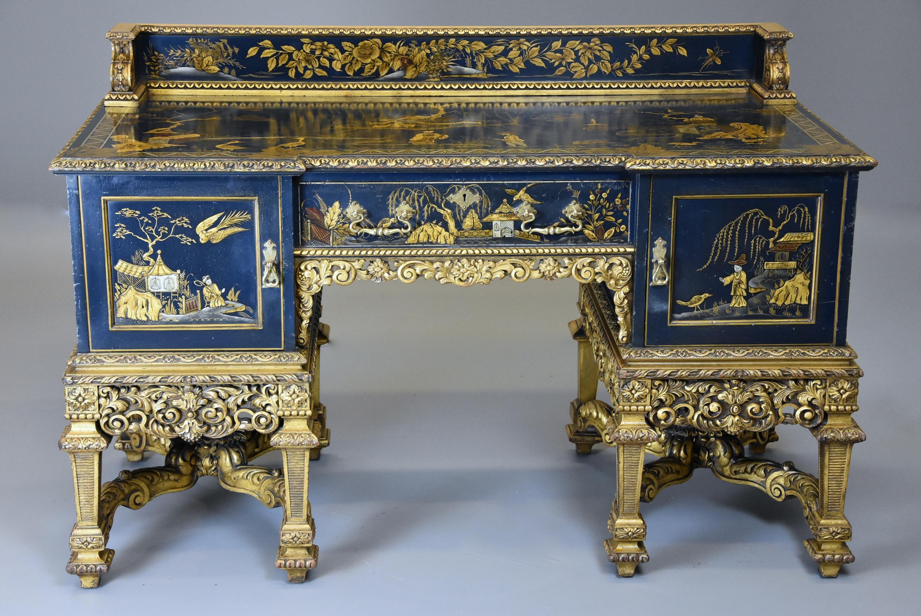 A superb quality highly decorative early 20th century Charles II style chinoiserie dressing table or desk. 

This dressing or desk consists of a finely carved and lacquered upstand to the back with floral and foliate decoration with and an egg and