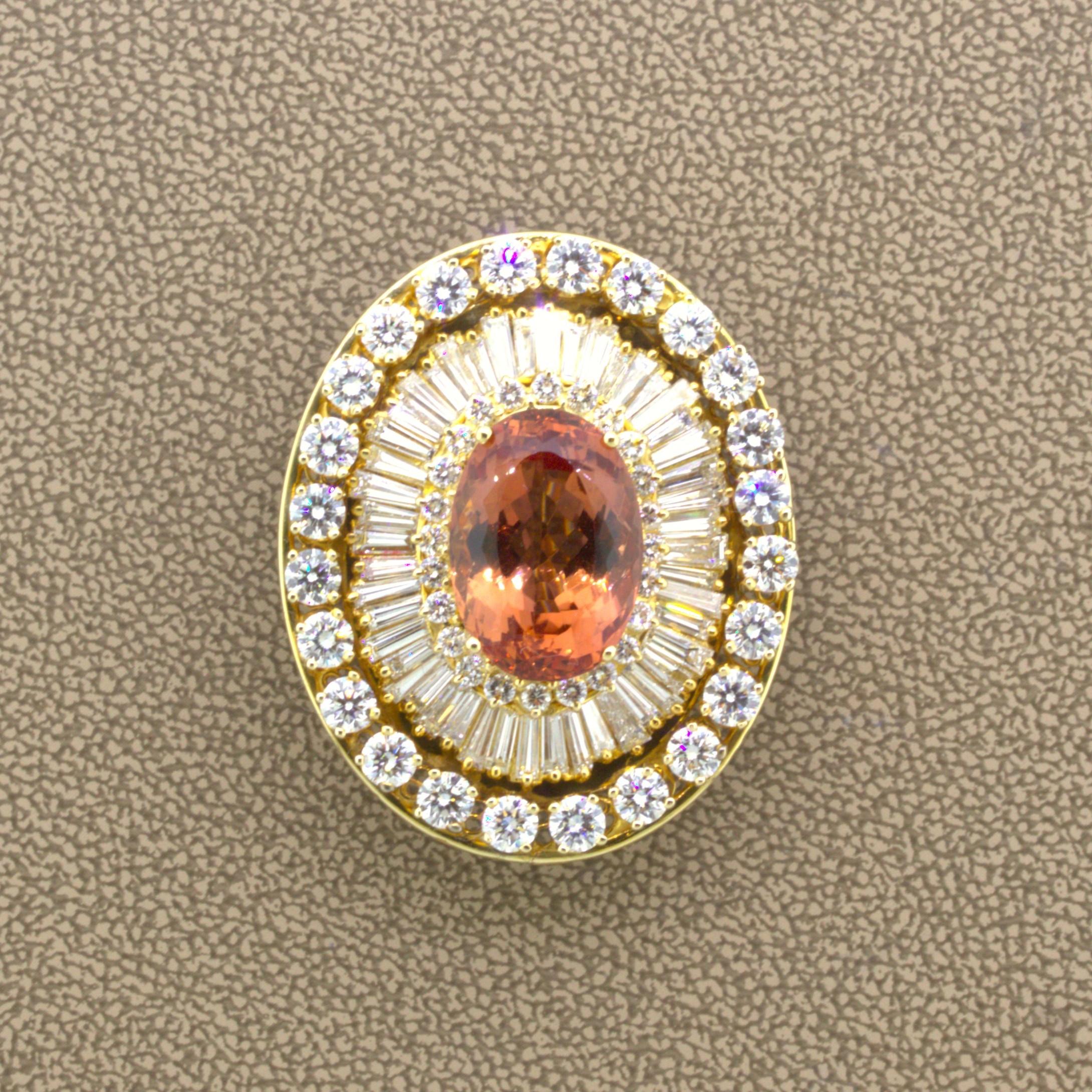 Simply stunning. A beautiful imperial topaz brooch featuring a top gem quality topaz weighing an impressive 13.27 carats. The brooch is so special that it was featured in the GIA’s quarterly magazine, “Gems and Gemology” due to its high quality and