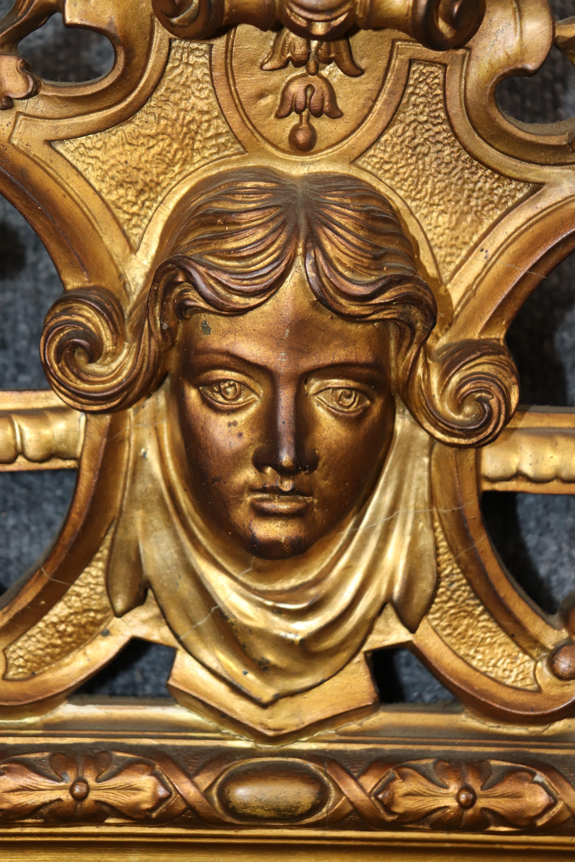 This is a gorgeous carved mirror with a carved figural representation of the Swedish soprano Jenny Lind. Measures 46.5 tall x 24 wide x 6.5 deep. The piece is carved wood and gesso and in good antique condition. 