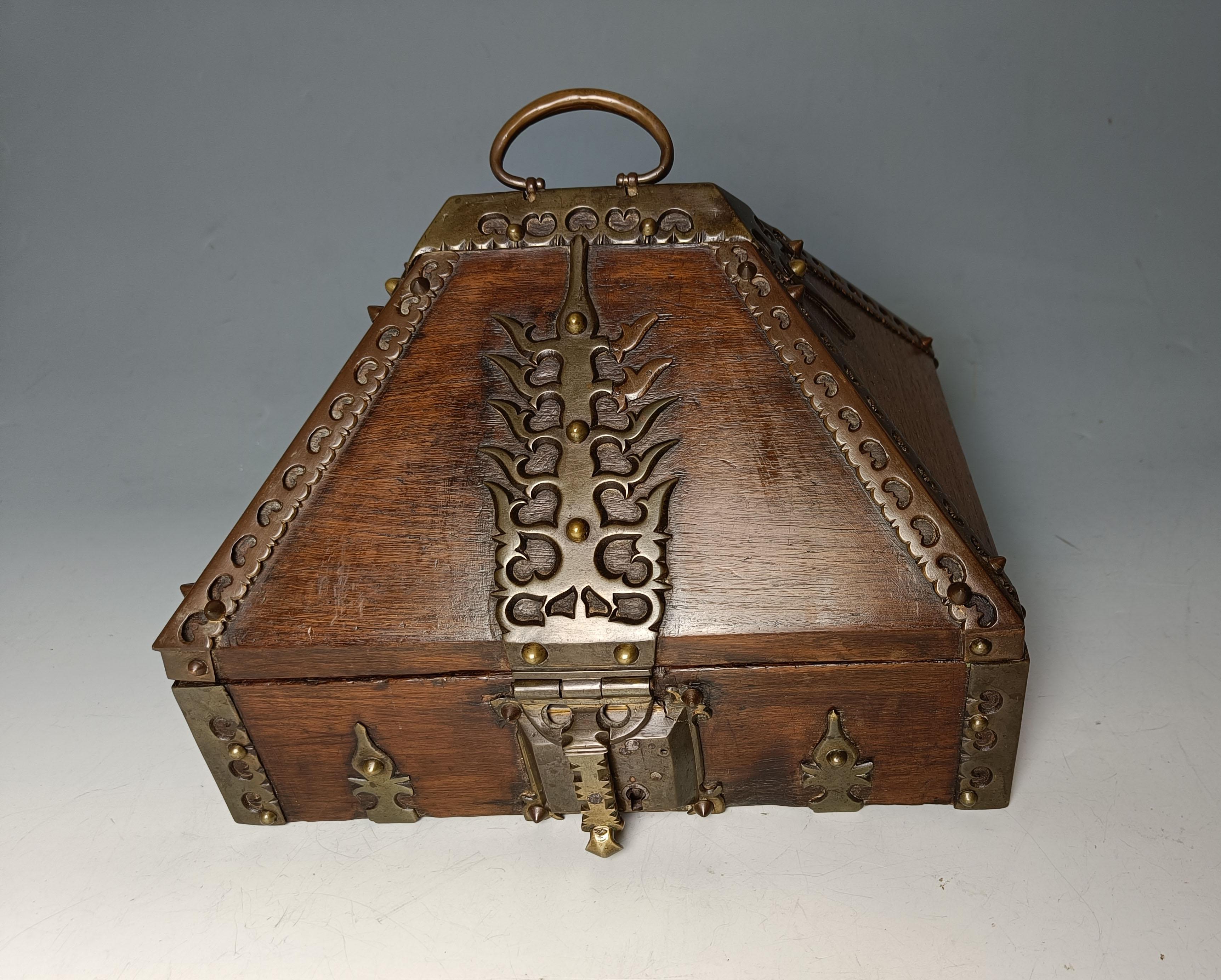  
A Superb Large Antique South Indian Kerala dowry box
This Fine example shows a vast amount of patinated brass ornamentation decoration . internally there is one sub division. The main construction is of solid teak

This beautiful late 19th century
