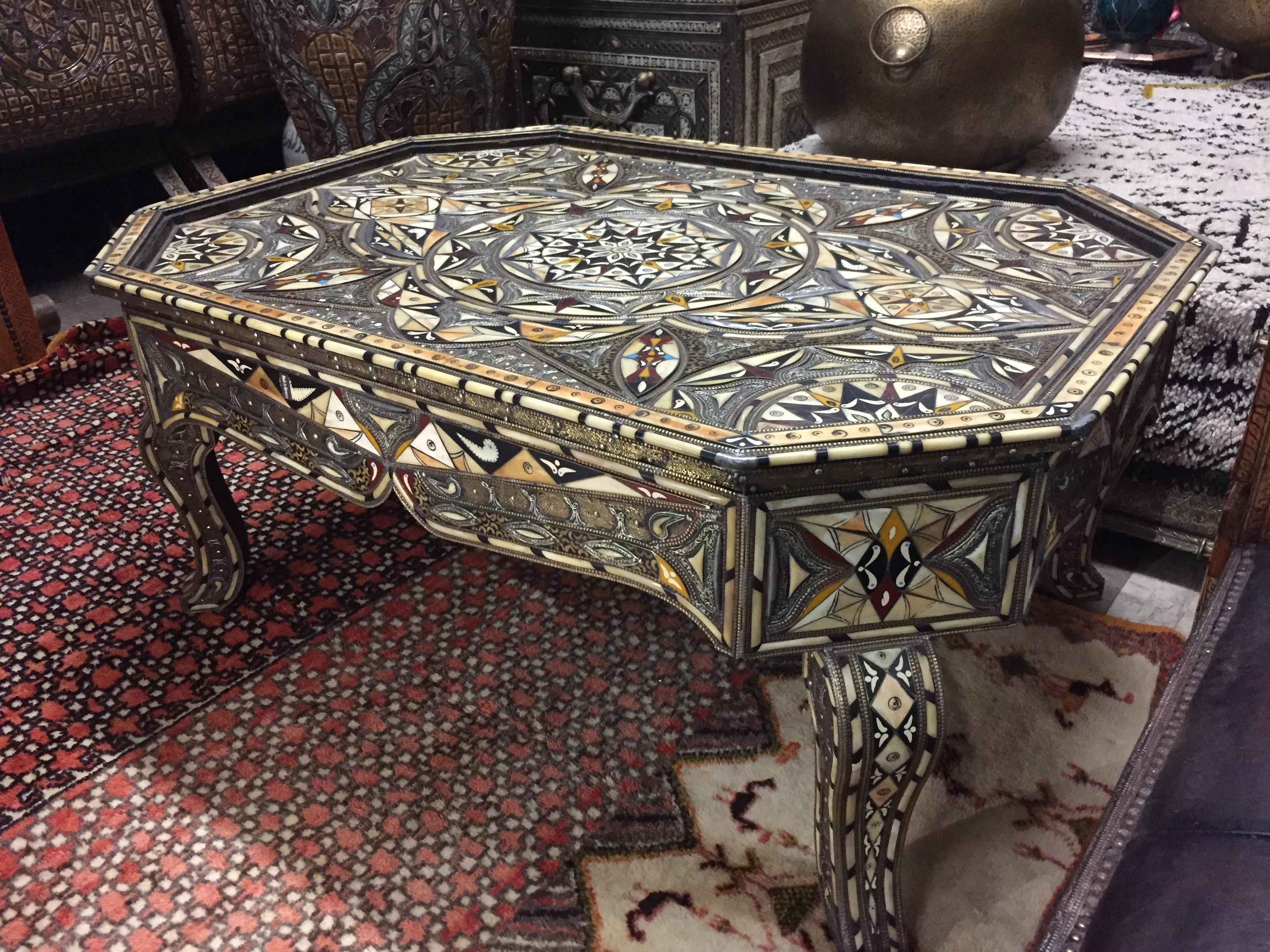 Beautiful large coffee table from Morocco inlay with camel bone and tooled metal made by the best artisans.