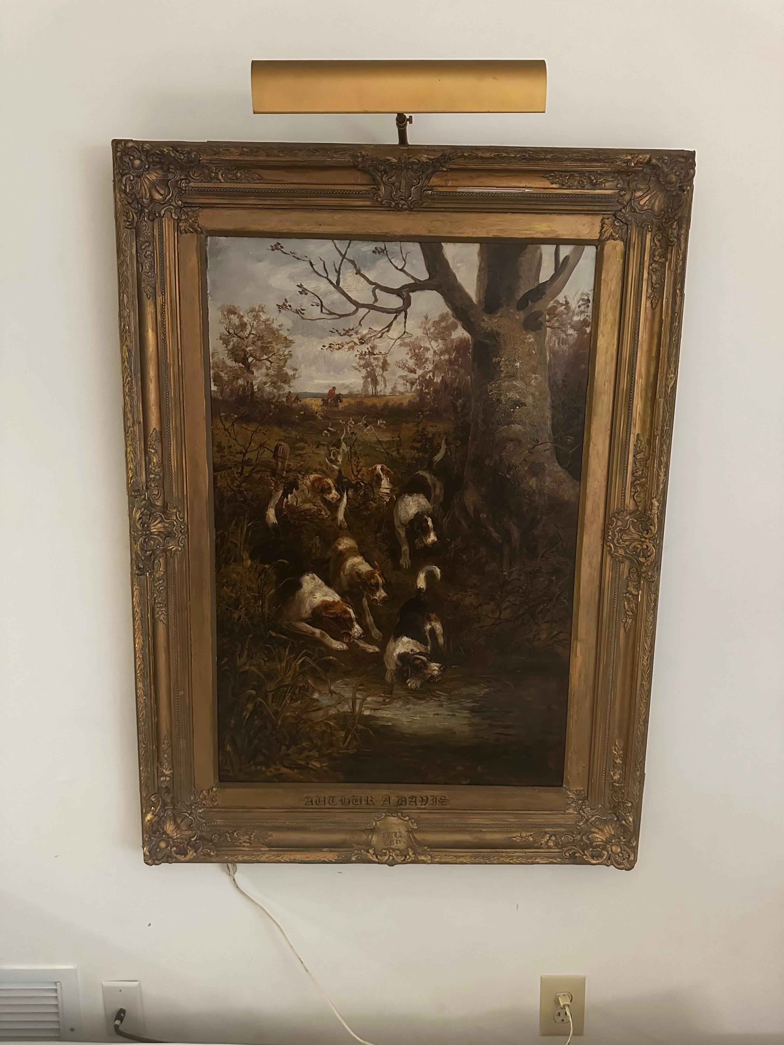 Scène de chasse fantastique avec meute de chiens par Arthur Alfred Davis, 