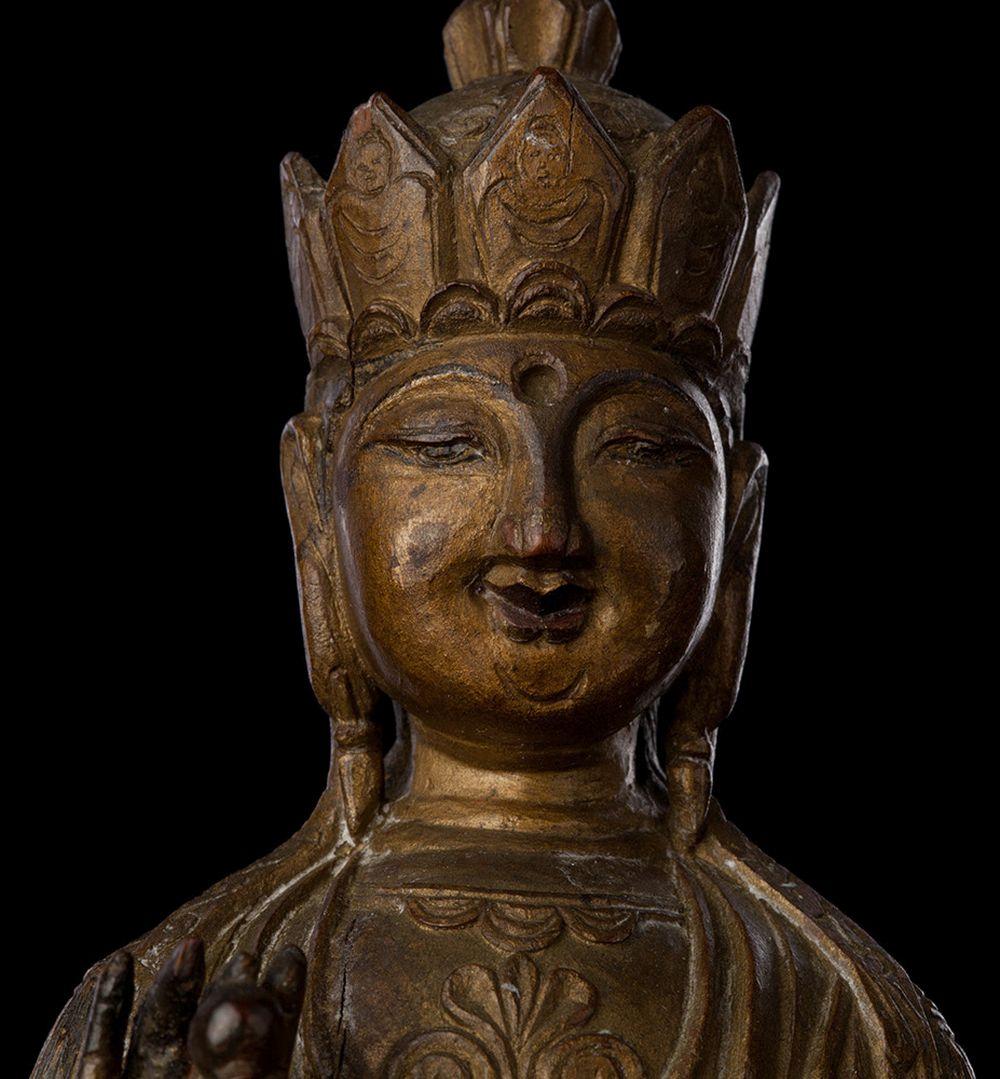 Superb late 18thC Chinese wood Buddha. Extremely finely modeled with a greatly expressive face. In remarkable condition, with no damage, repair, or loss. There are expect-able minor surface cracks in the painted/lacquered surface (as seen in photos)