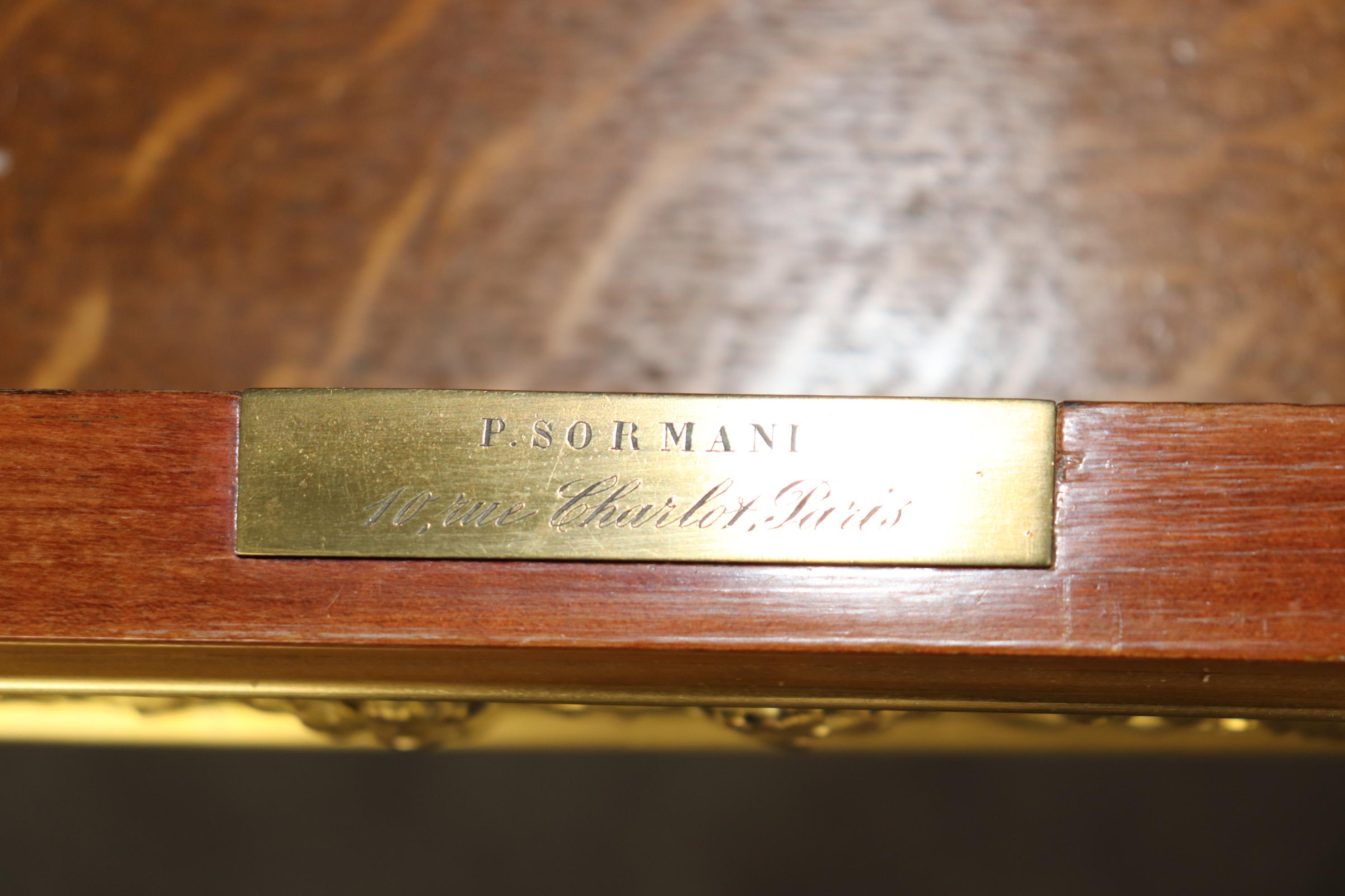This is an extraordinary games or card table made by the famous cabinetmaker Paul Sormani of Paris. The table features stunningly detailed bronze and brass ormolu and a newer felt top. The condition is good for its age and has minimal signs of age