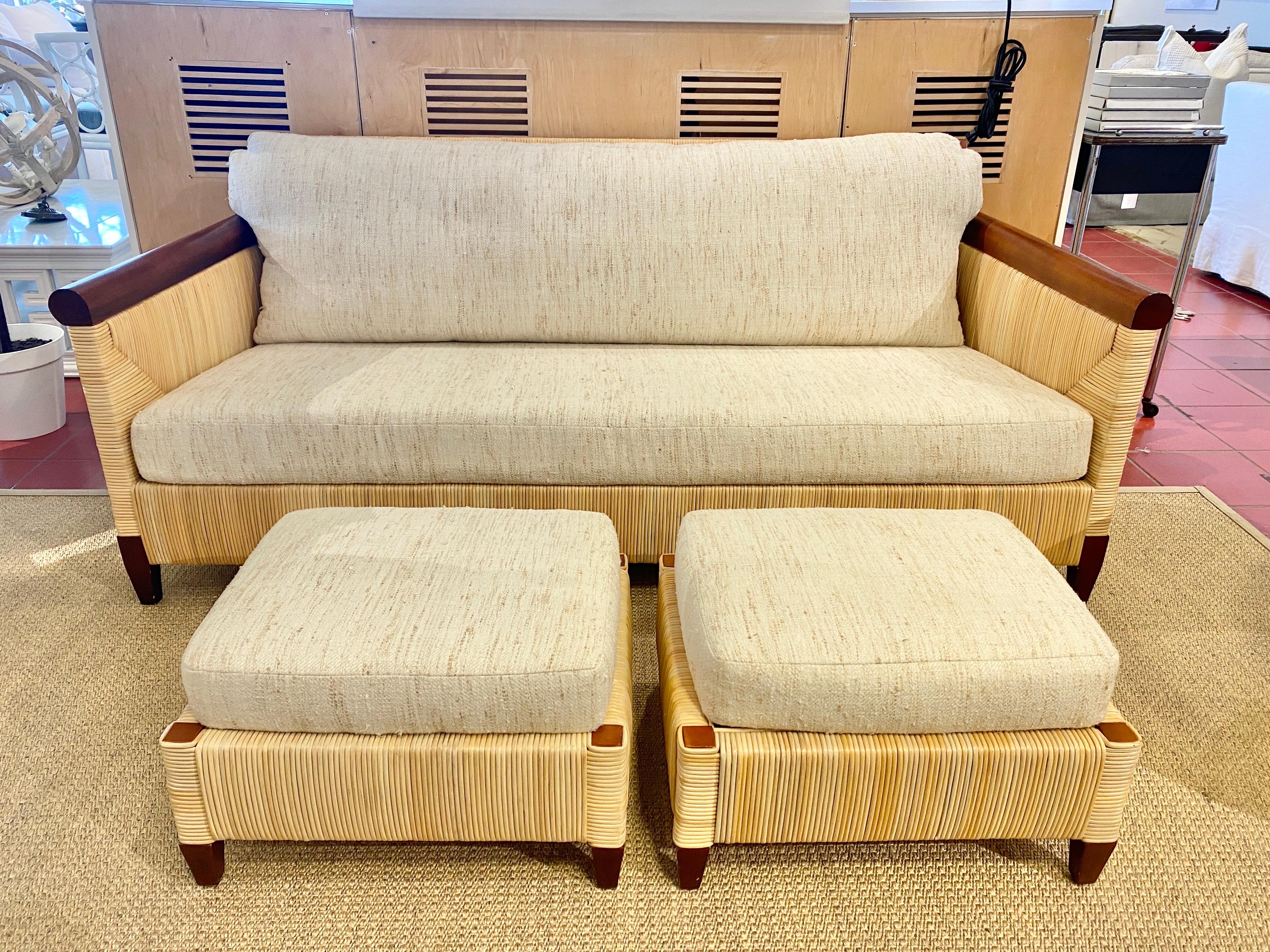 Superb Mahogany and wicker sofa with 2 matching ottomans by Donghia

Measures: Sofa 73