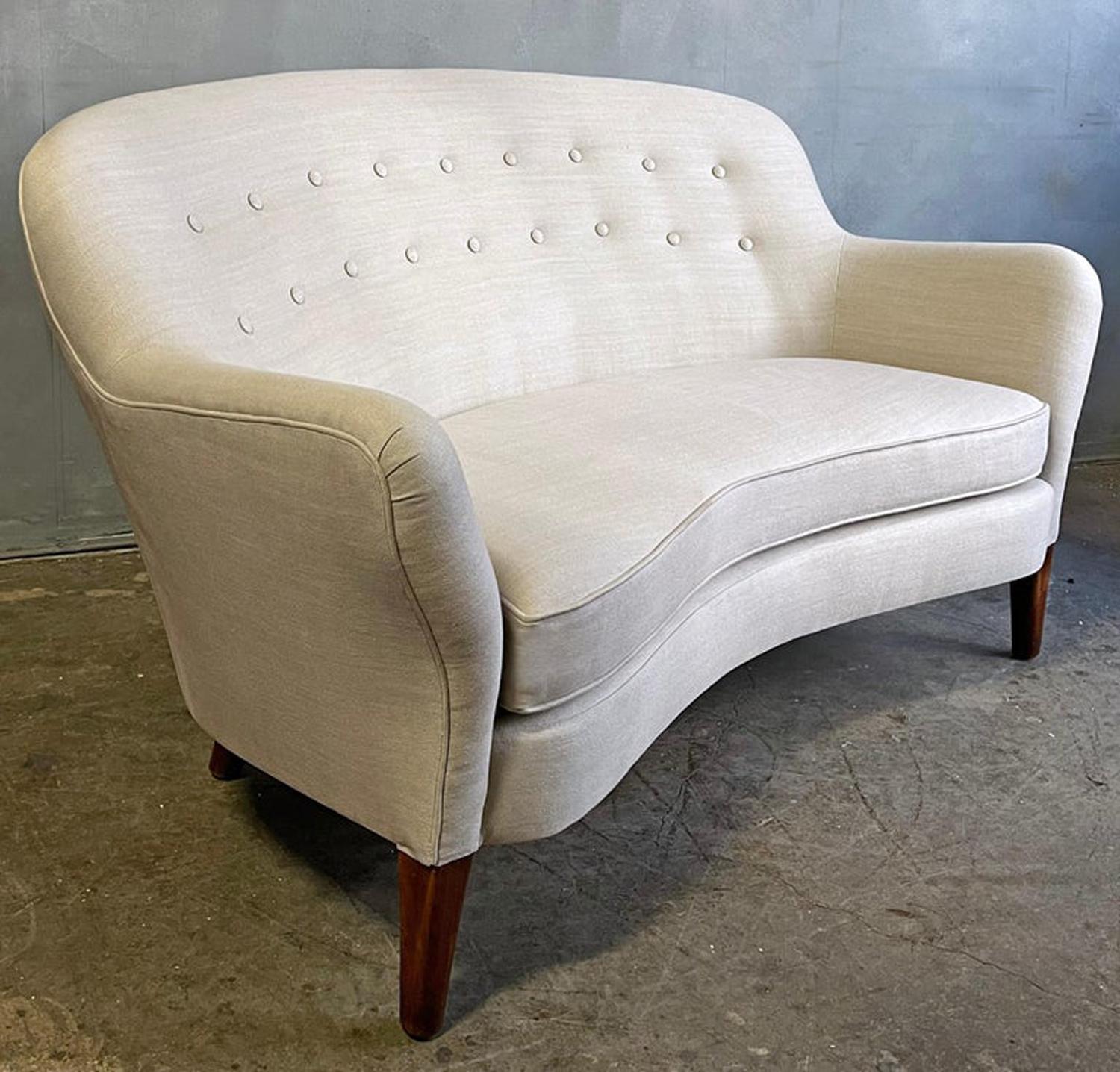 Nanna Ditzel petite Allé Sofa

Beautiful Danish two seat loose cushion sofa with graceful lines. Comfortable and petite. 

Fabric brand new of the highest quality fabric and fill. 

Photos taken both outdoors and indoors to show different light